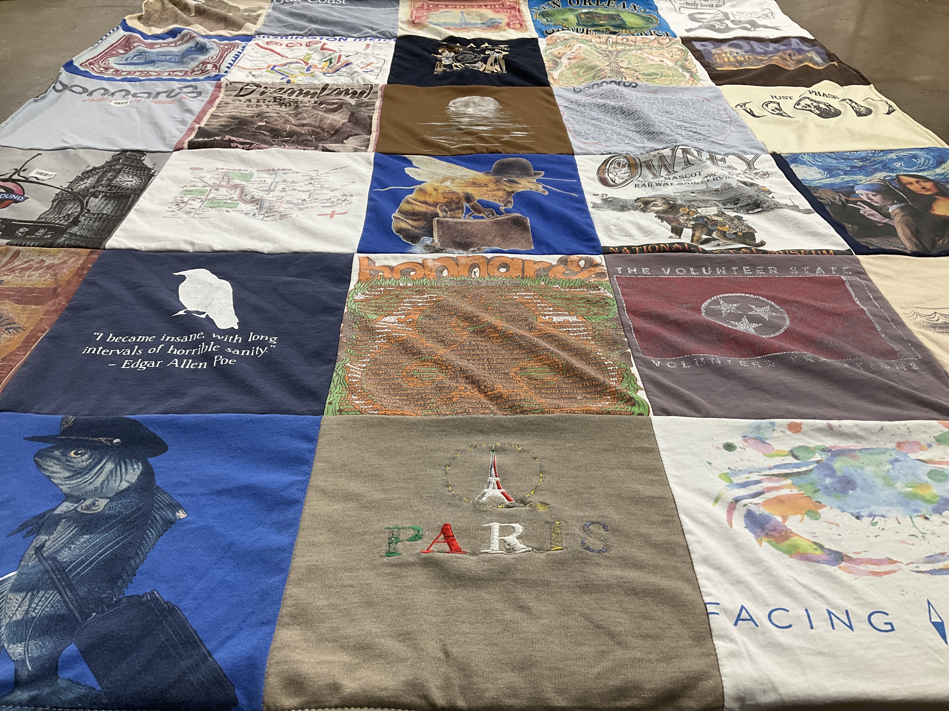 T-shirt quilt with literature, travel themes by Joseph from TN
