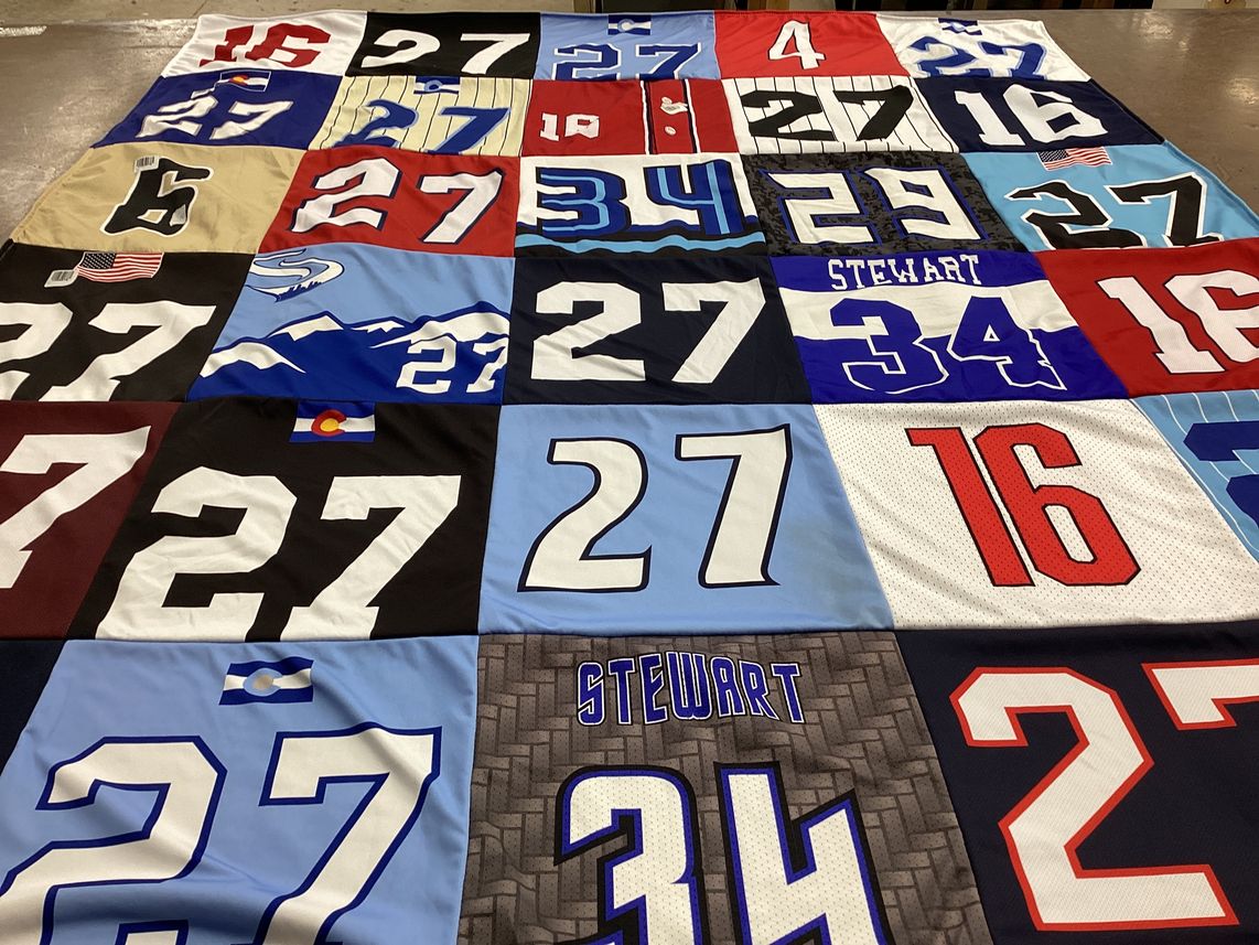 T-shirt quilt with sports, outdoors themes by Abby from CO