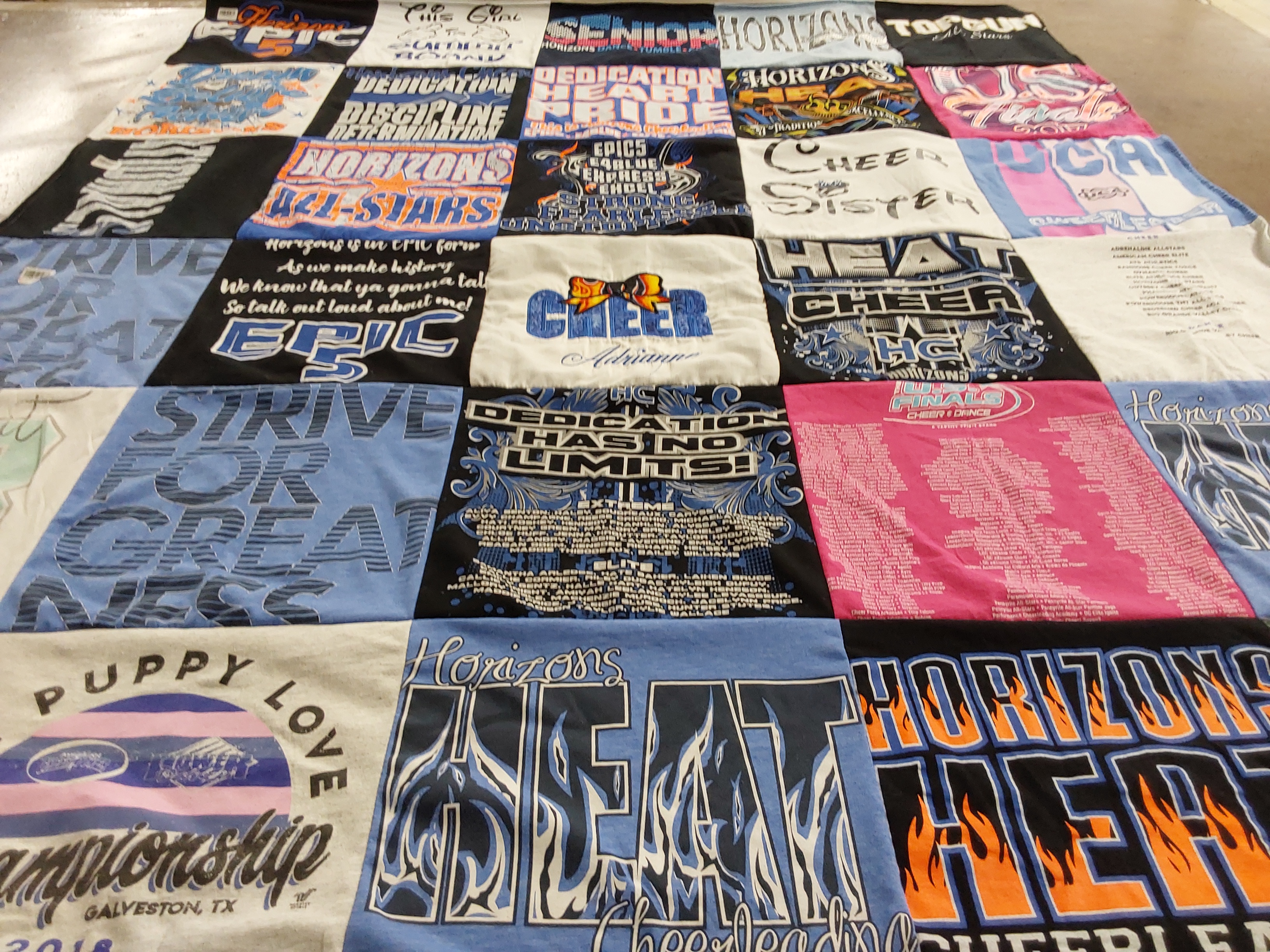 T-shirt quilt with cheerleading themes by Natasha from TX
