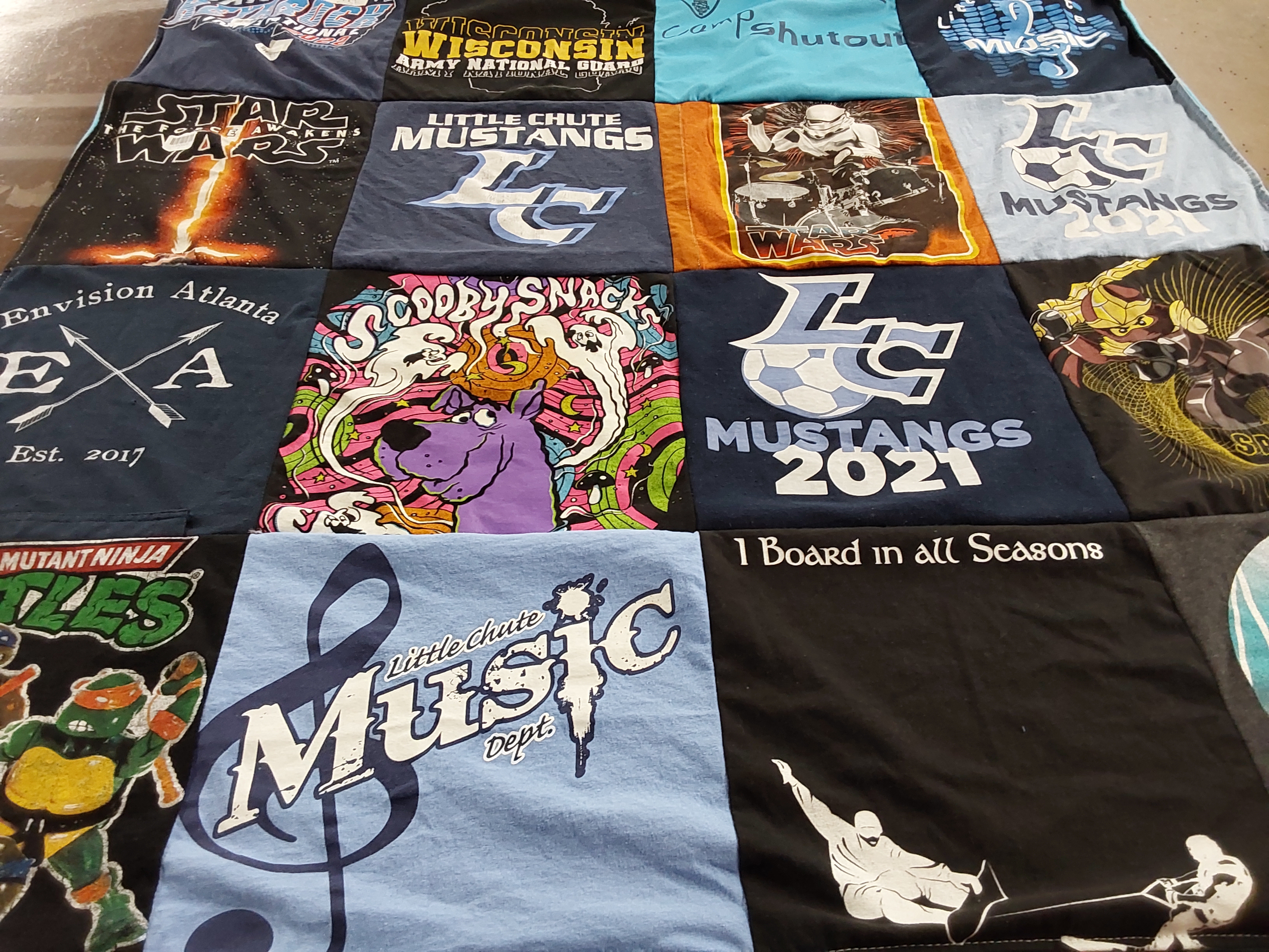 T-shirt quilt featuring little chute mustangs by Susan from WI