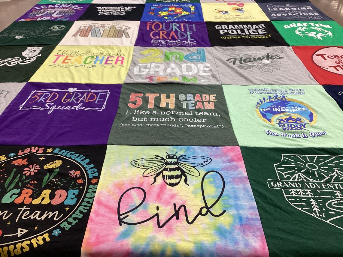 T-shirt quilt with education, teaching themes by Karen Marie from MA