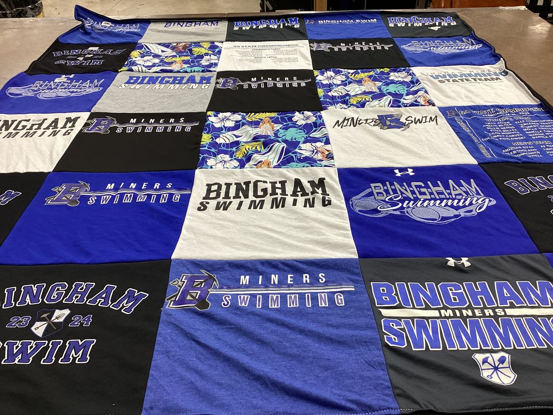 T-shirt quilt featuring bingham miners swim team by Jill from UT