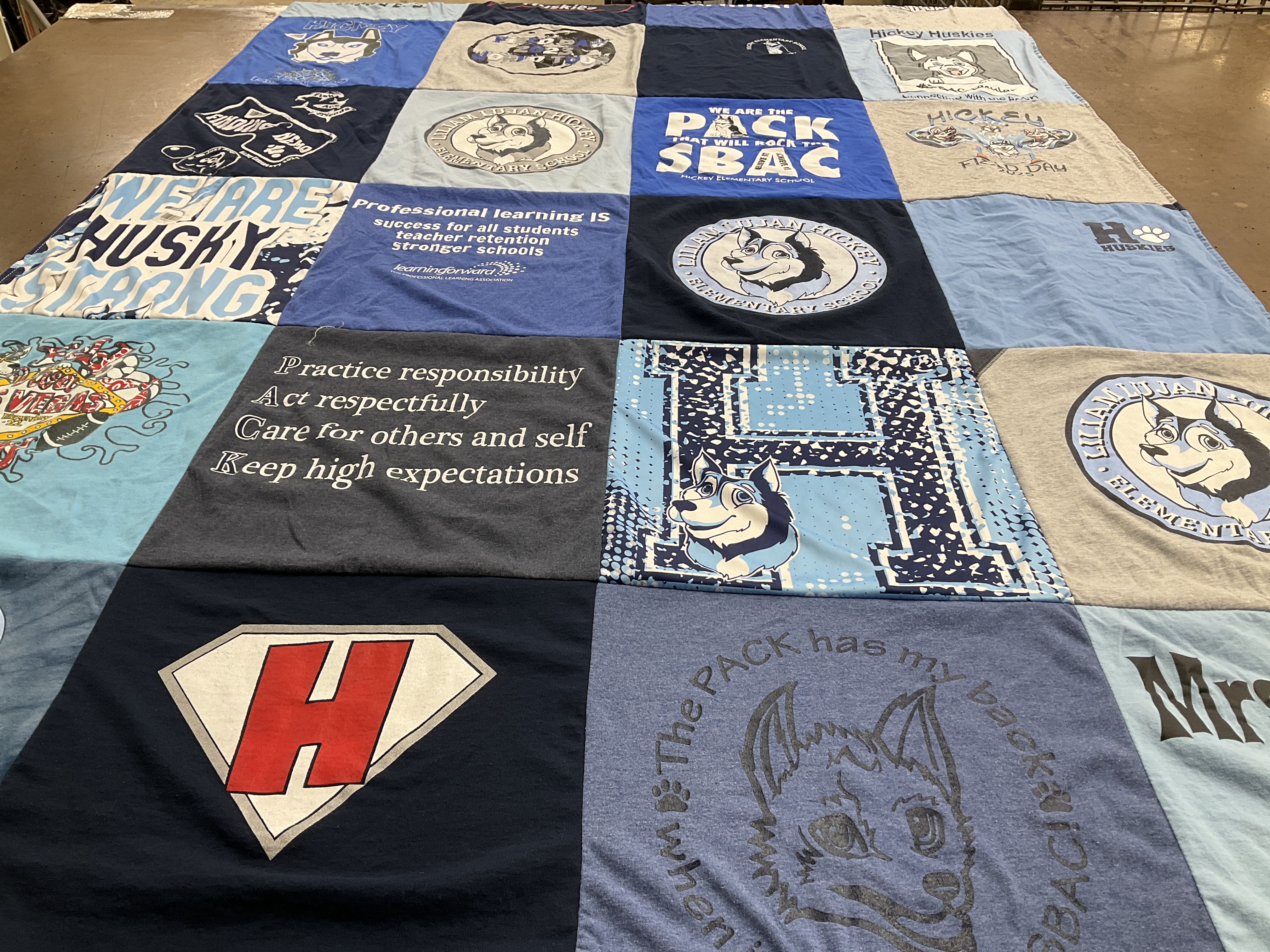 T-shirt quilt featuring hickory huskies by Ronalyn from NV
