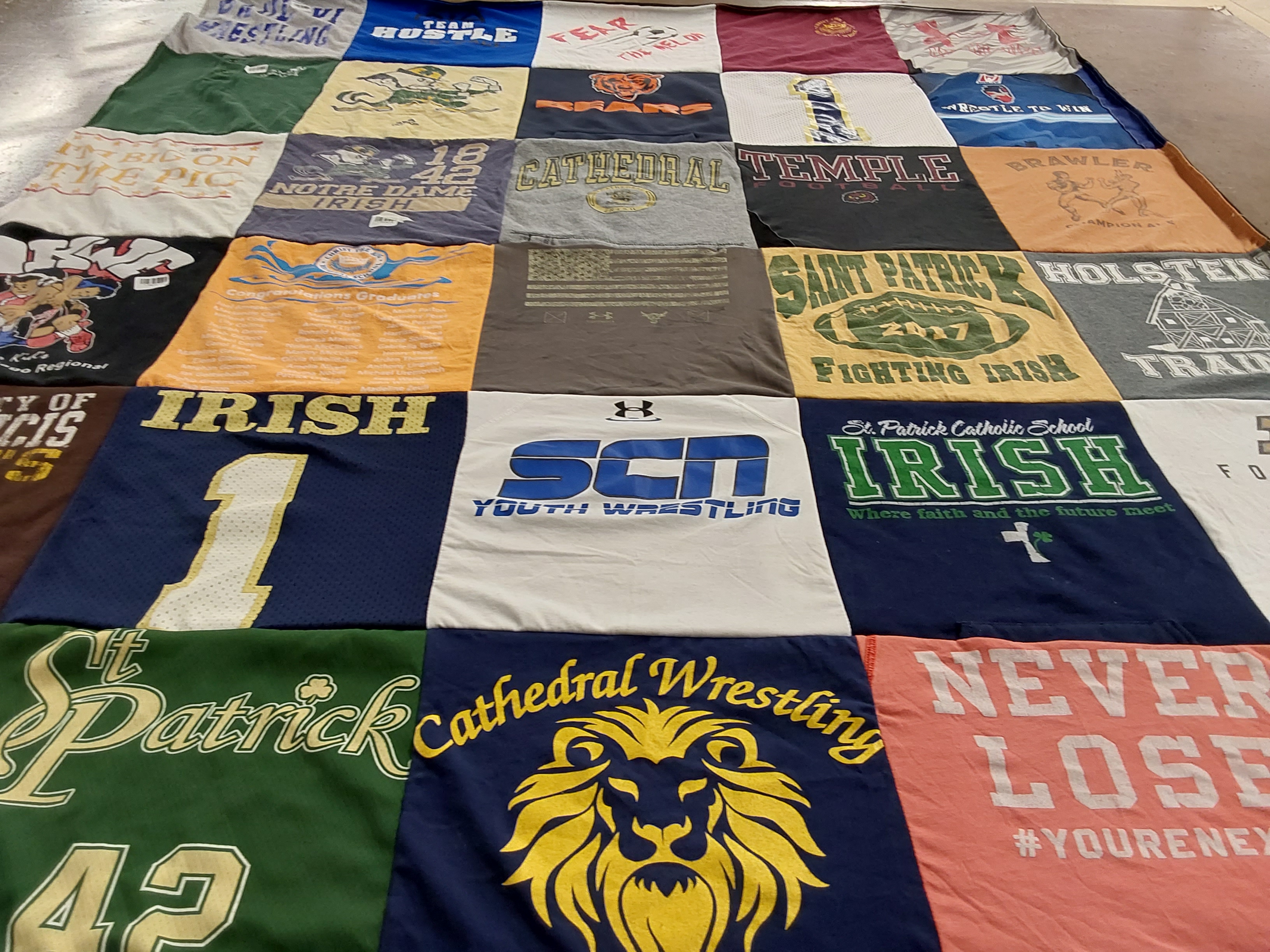T-shirt quilt featuring fighting irish, cathedral wrestling by Katrina from IN