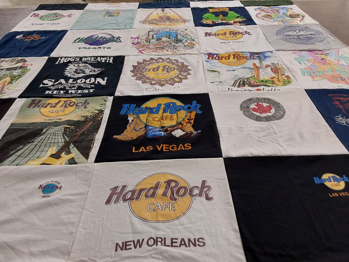 T-shirt quilt with music, travel themes by Debra from IL