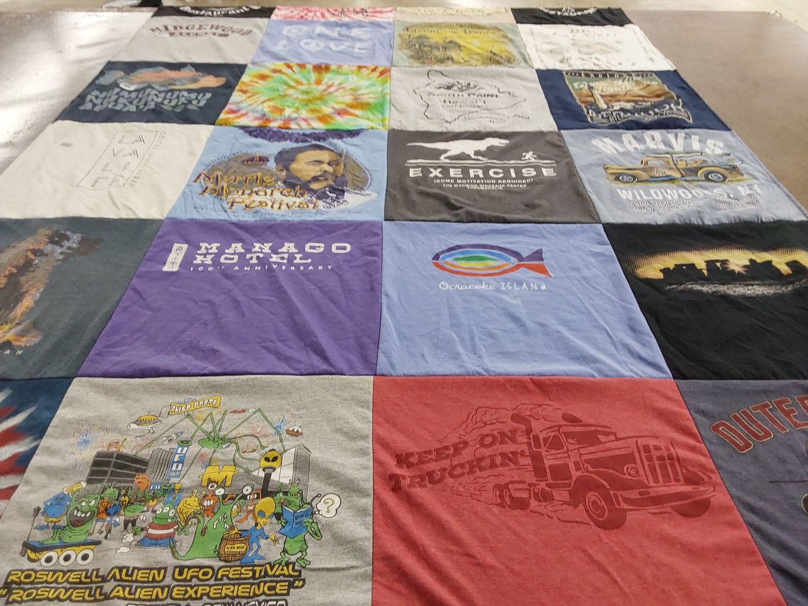 T-shirt quilt with travel, aliens themes by Susan from DE