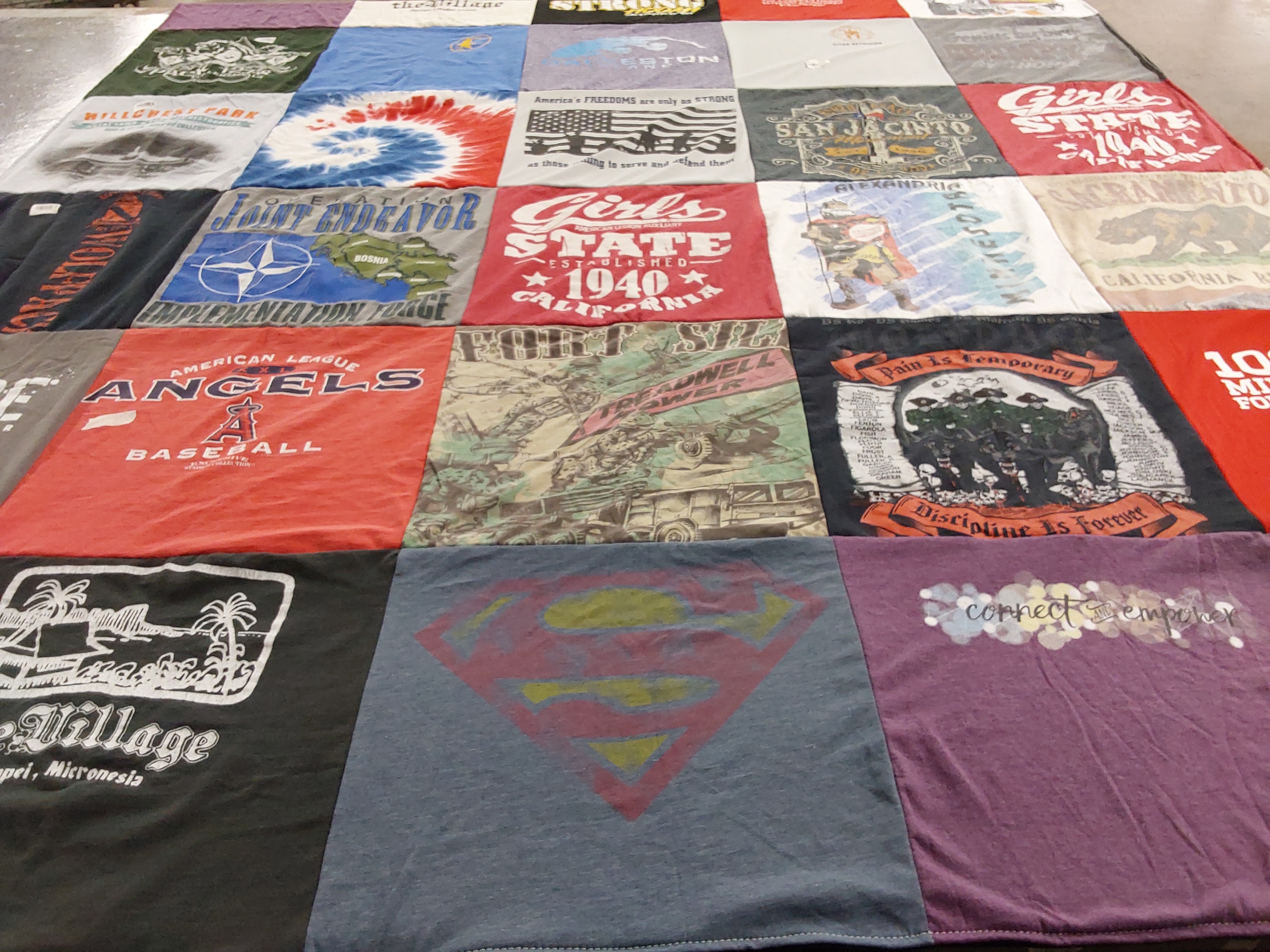 T-shirt quilt with baseball, military themes by Marilyn from CA