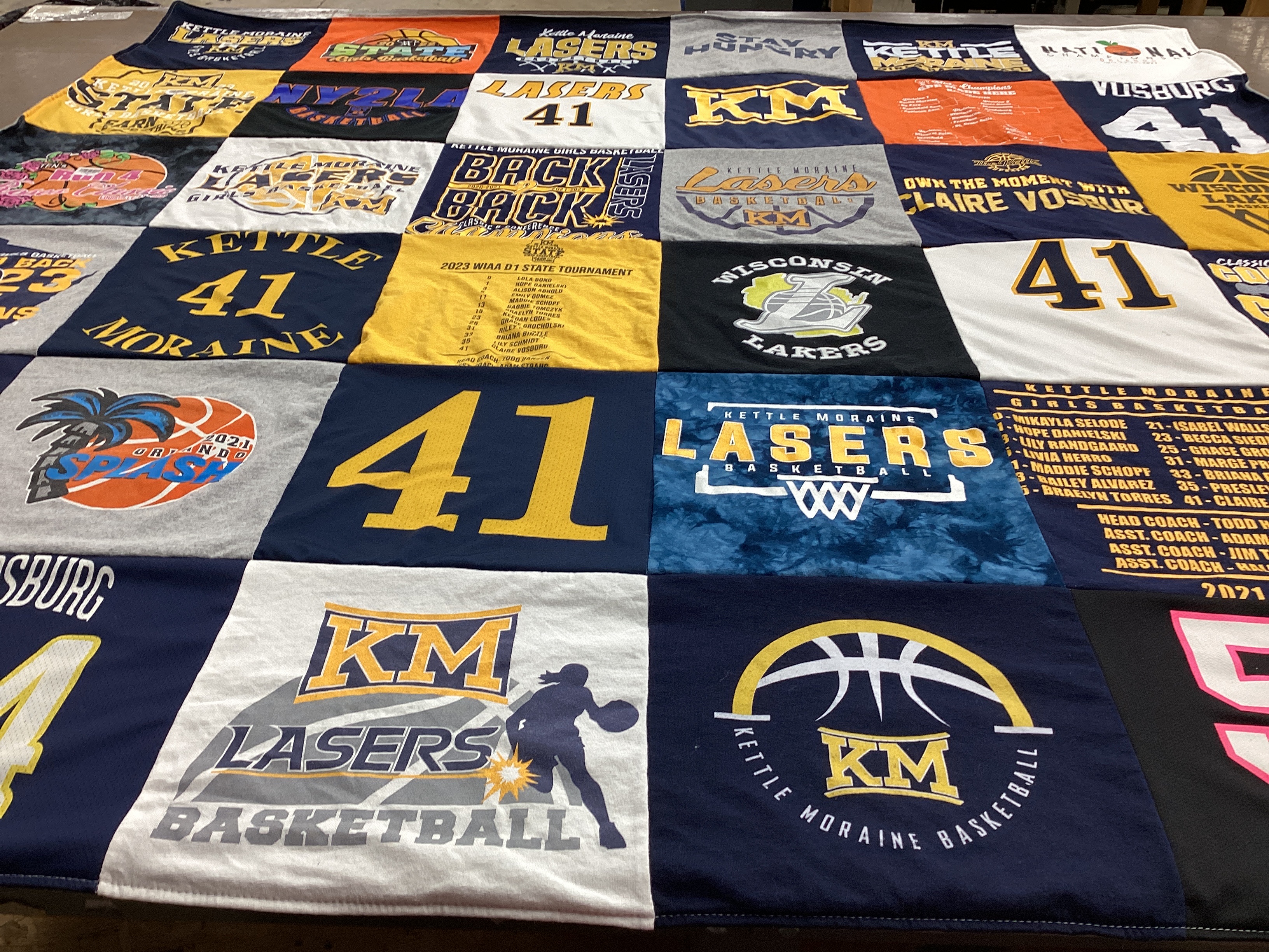 T-shirt quilt featuring kettle moraine lasers women's basketball, wisconsin lasers by Deborah from WI