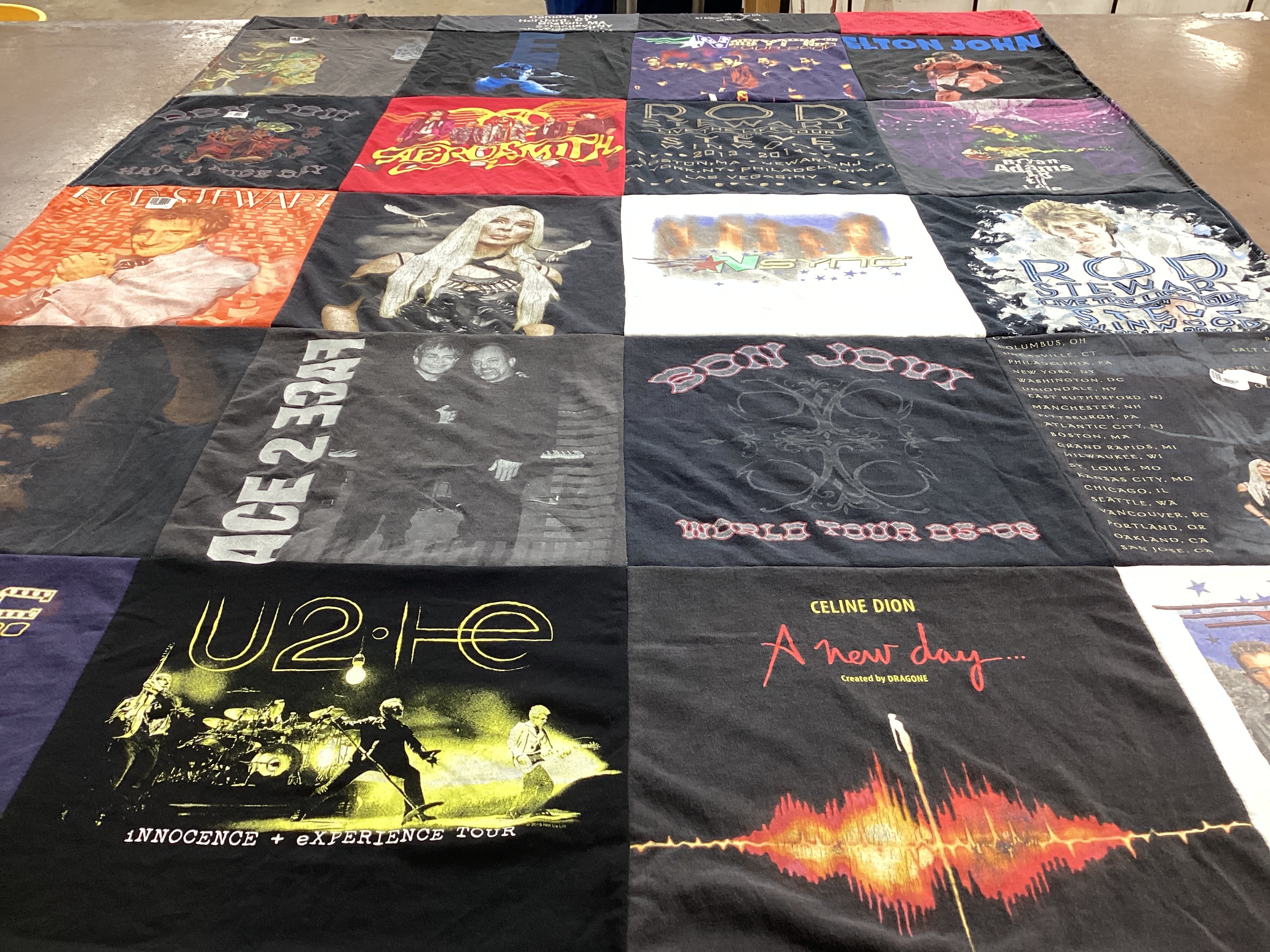 T-shirt quilt with music, concerts themes by Margaret from MA