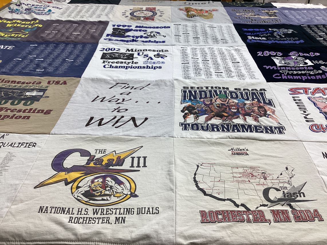 T-shirt quilt with wrestling, sports themes by Diana from MN