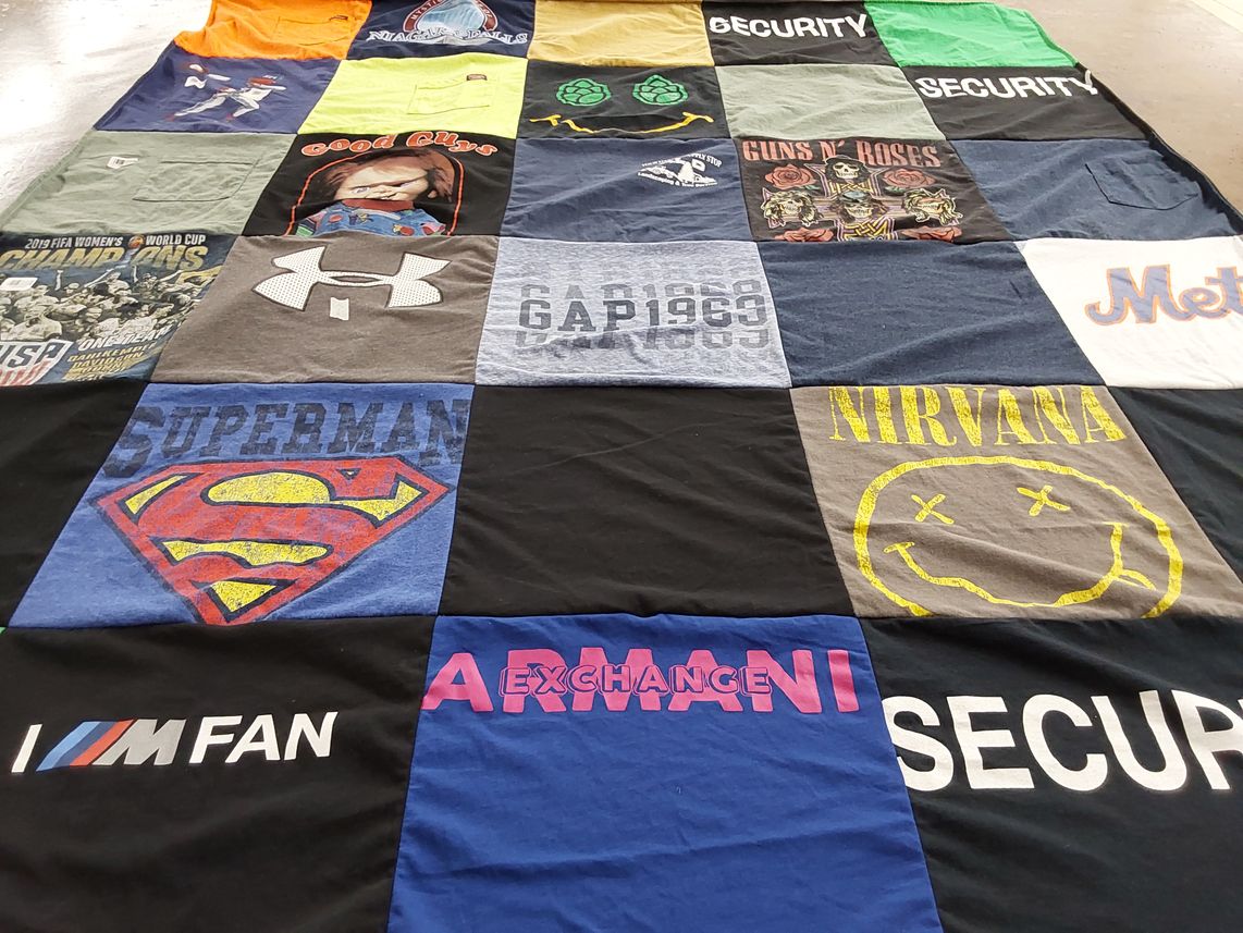 T-shirt quilt with music, sports themes by Kathy from NJ