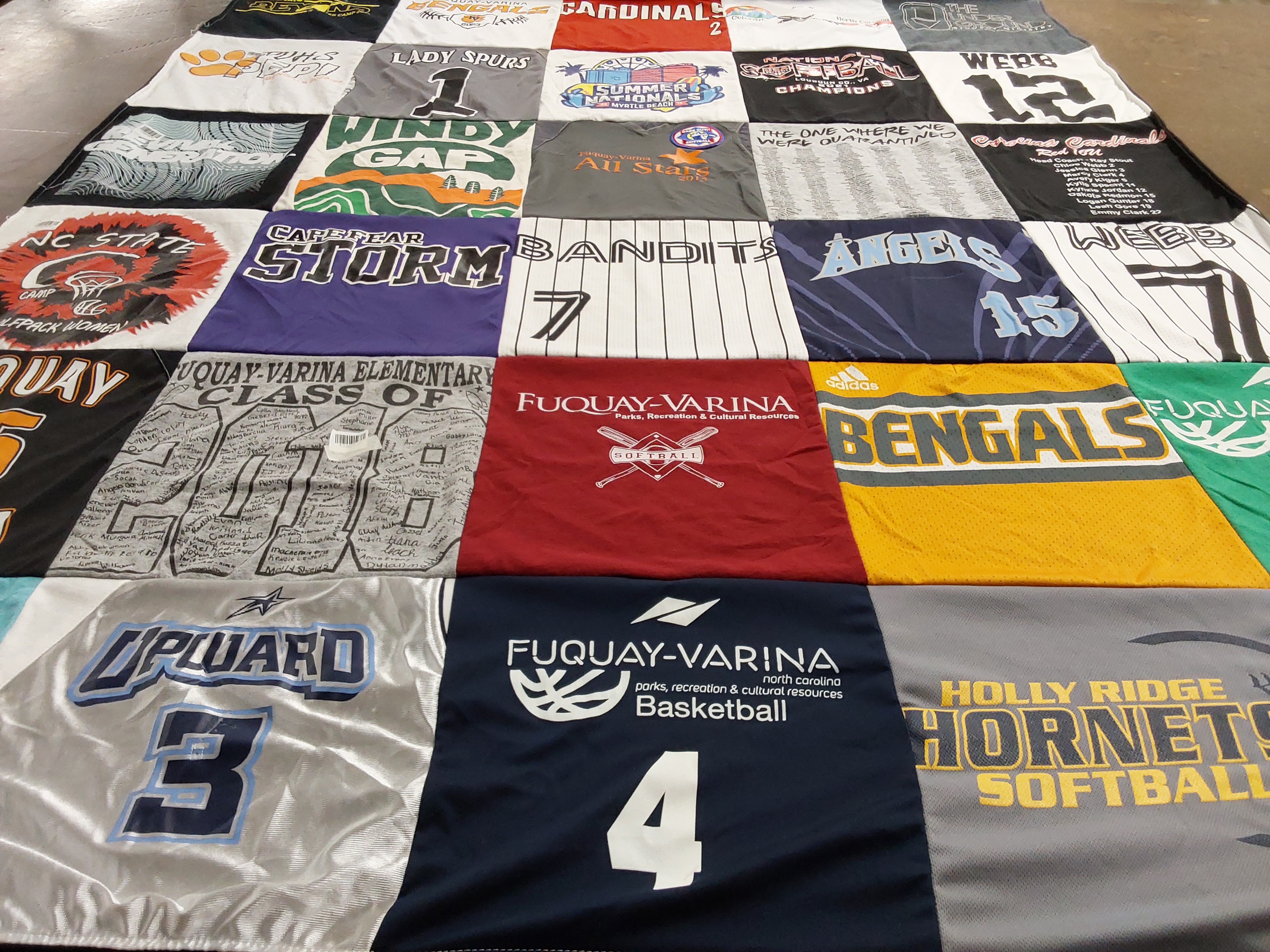 T-shirt quilt featuring fuquay-varina bengals, fuquay-varina hornets by Lori from NC
