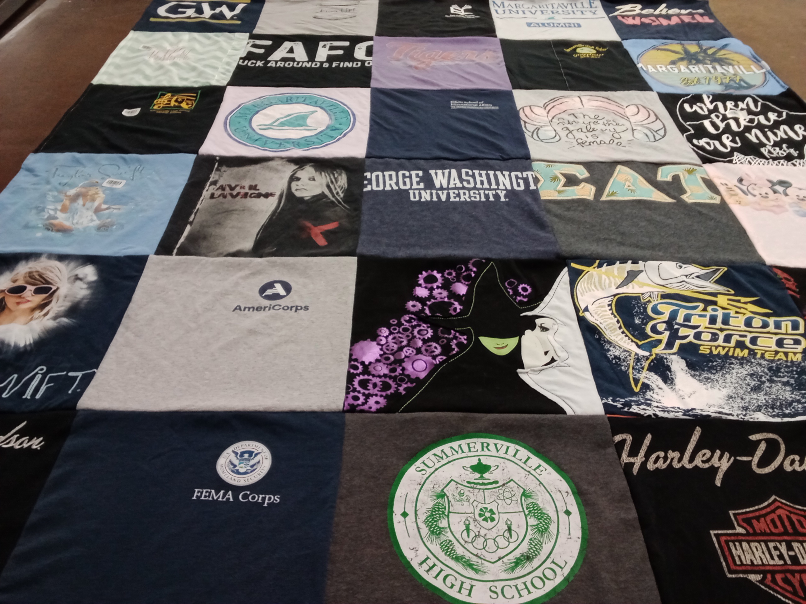 T-shirt quilt featuring triton force swim team by Christine from SC