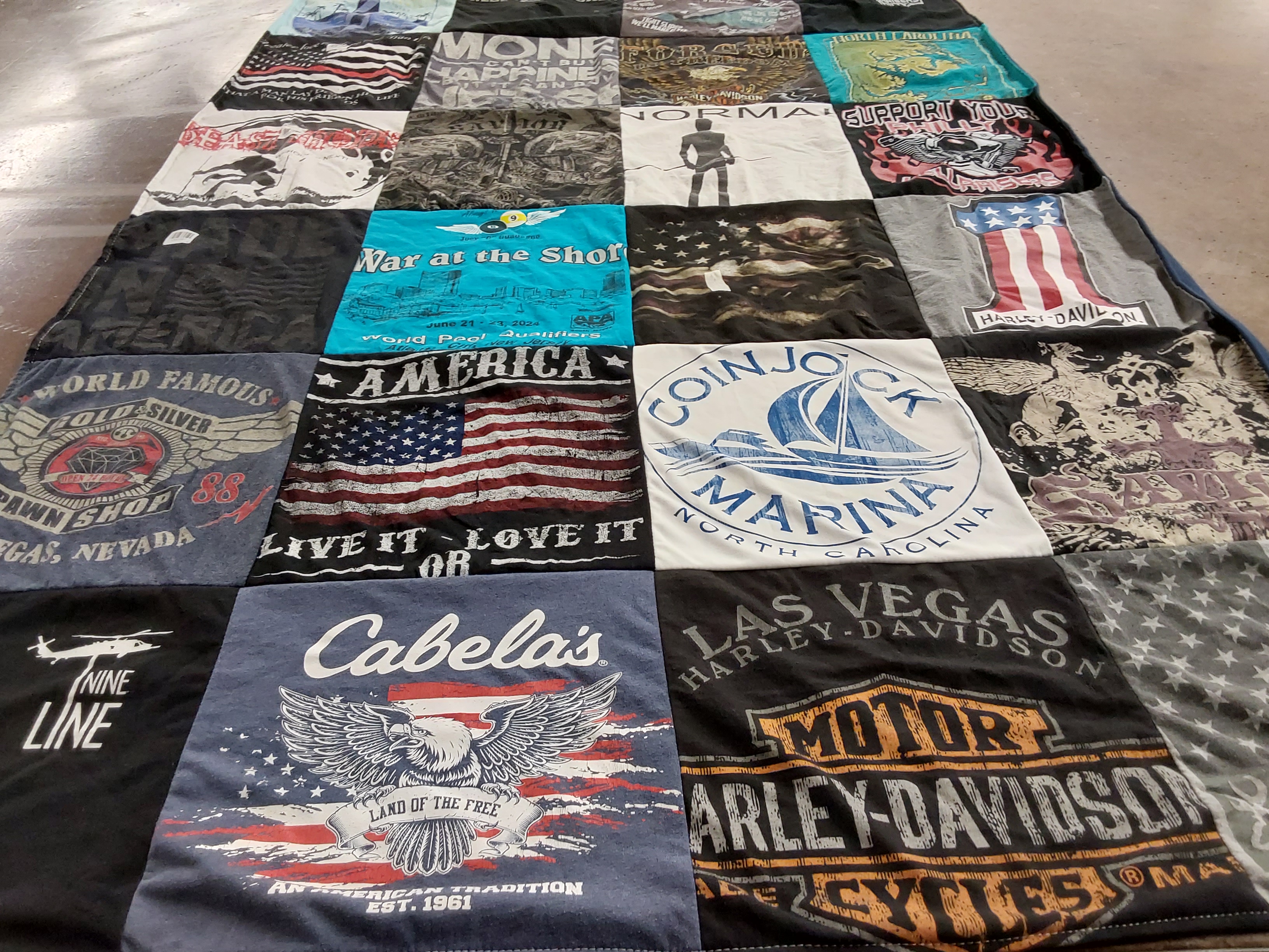 T-shirt quilt with motorcycles, hunting themes by Donna from PA