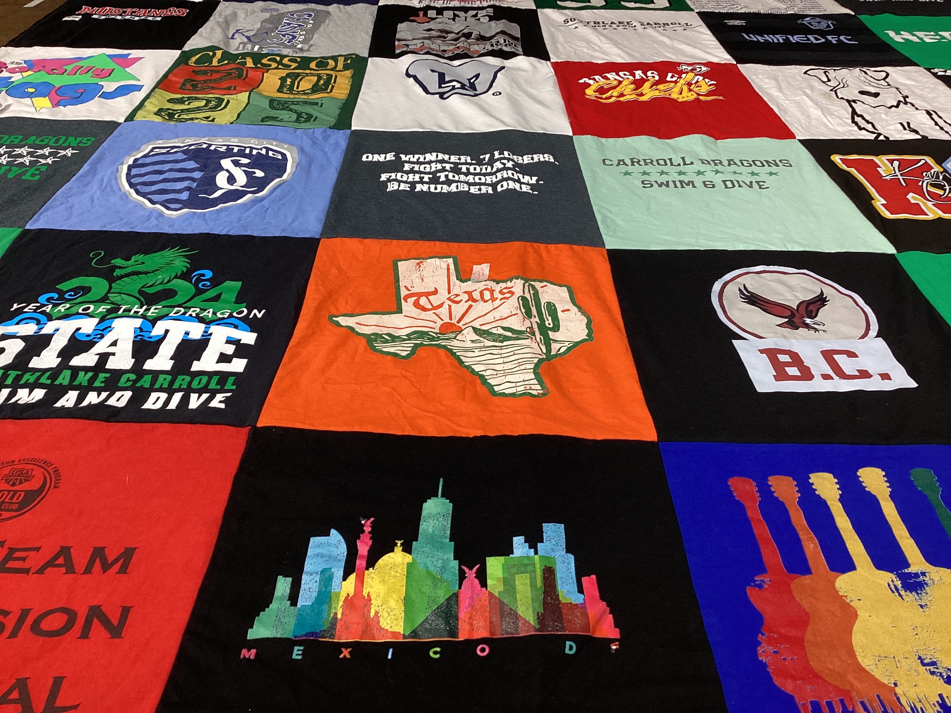 T-shirt quilt featuring southlake carroll swim and dive team by Jennifer from TX