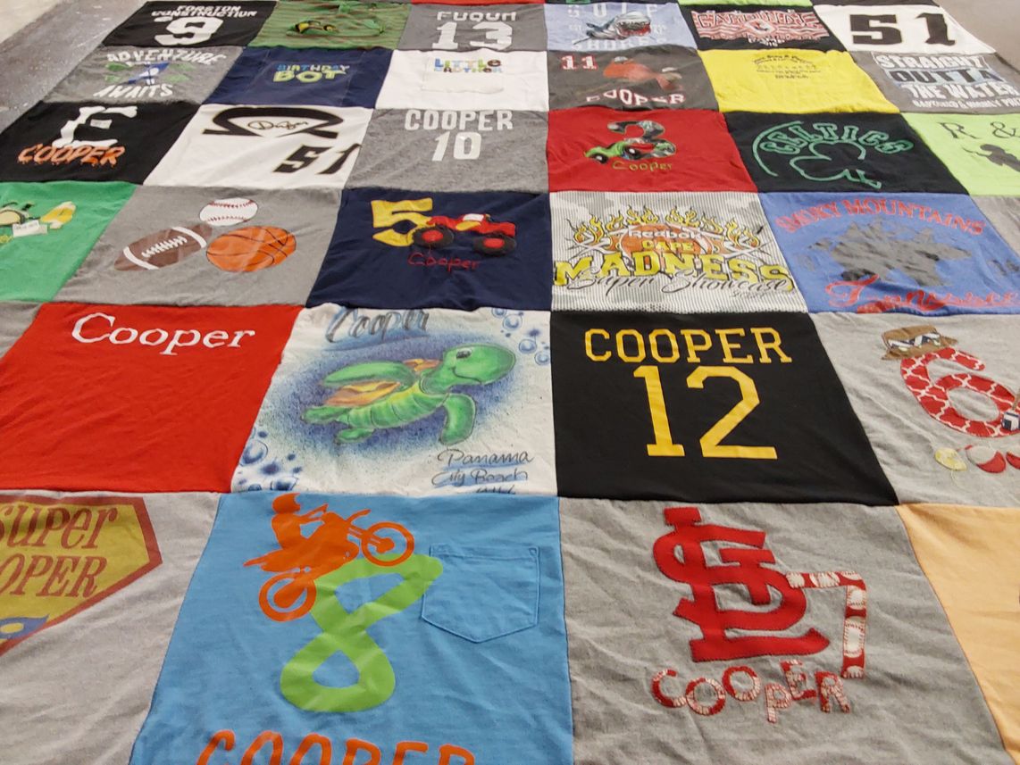 T-shirt quilt with sports, outdoor activities themes by Kimberly from IL