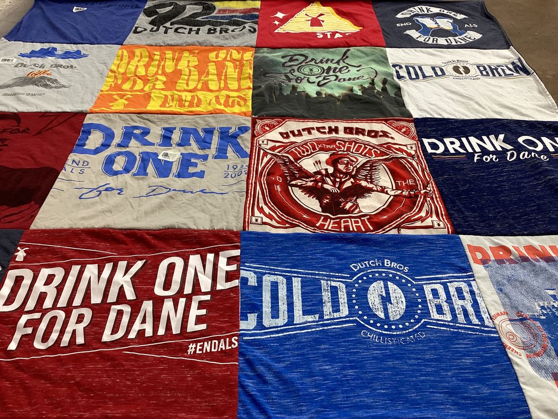 T-shirt quilt with coffee, community themes by Mattie from CO