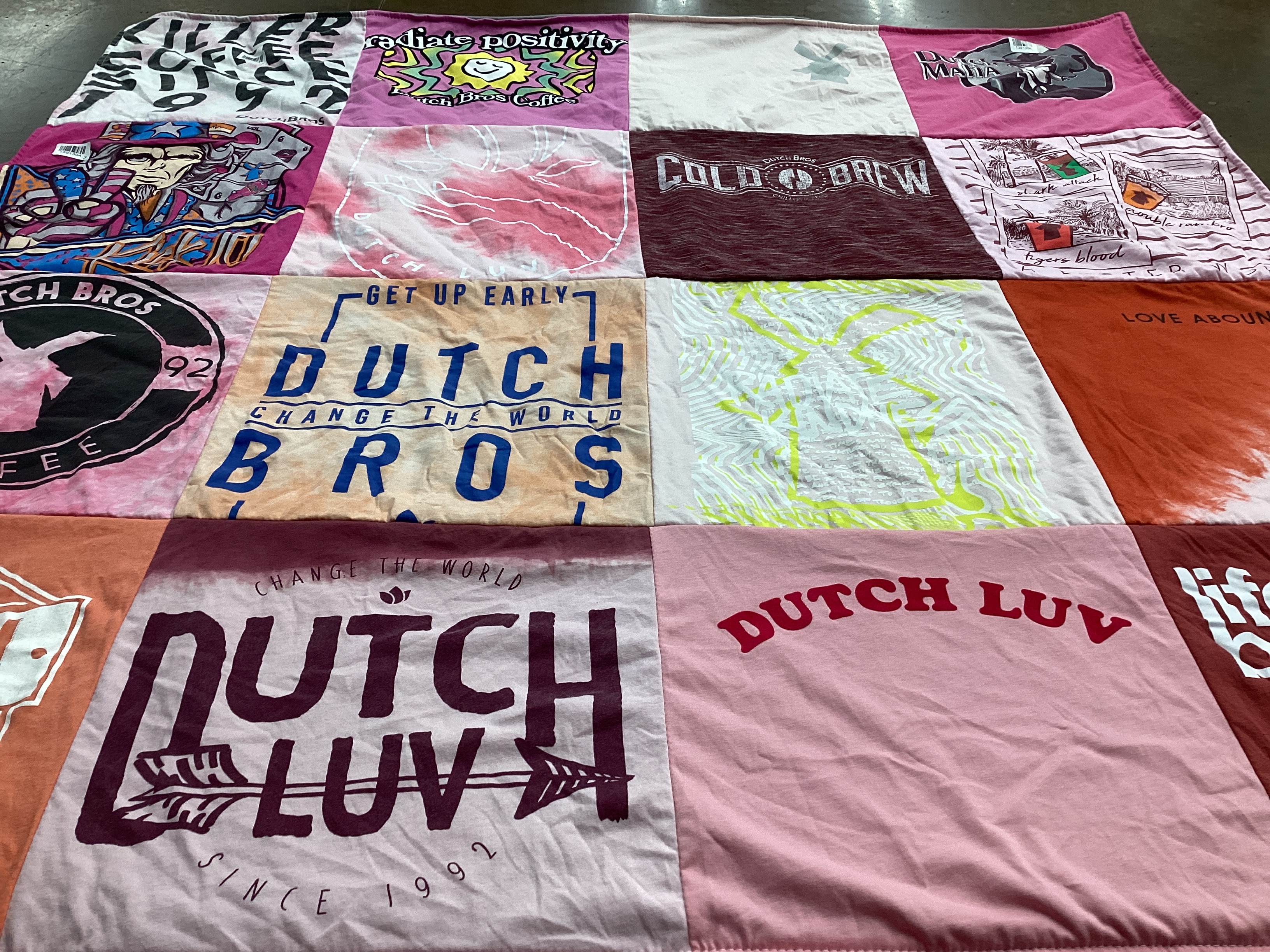T-shirt quilt with coffee culture, community themes by Mattie from CO