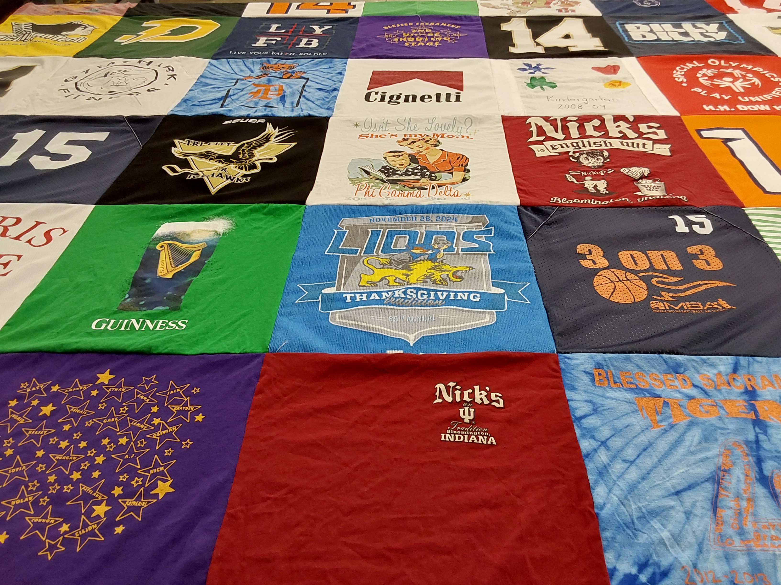 T-shirt quilt featuring 3 on 3, trinity royal hawks by Michelle from MI