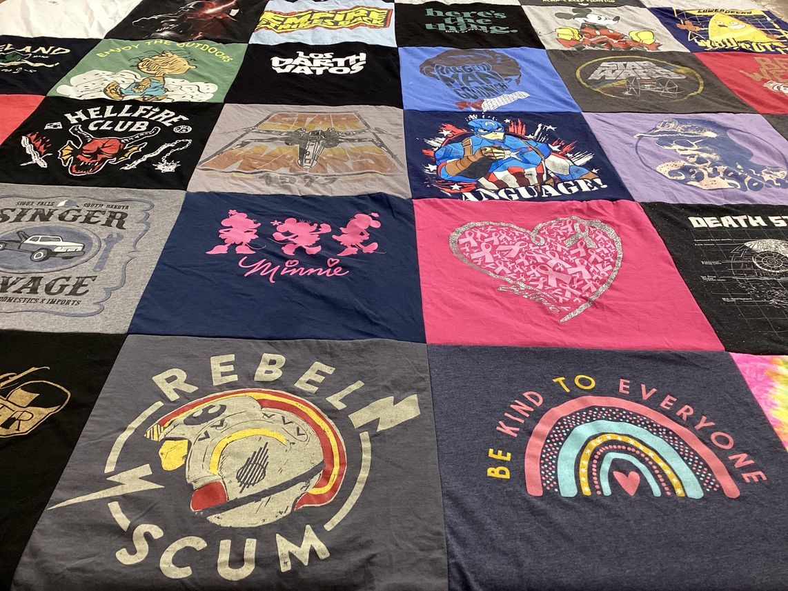 T-shirt quilt with outdoors, music themes by Lynn from CA