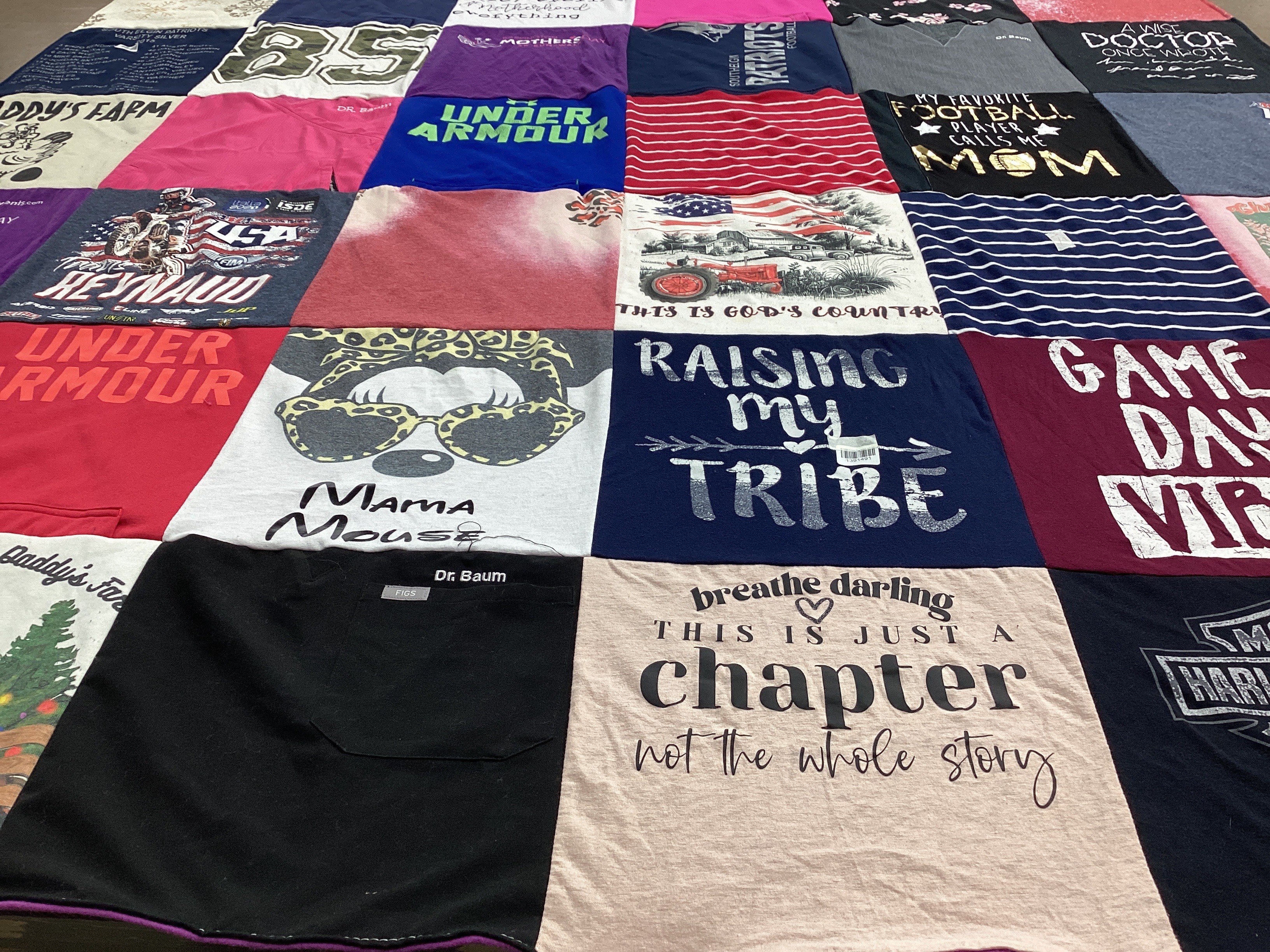 T-shirt quilt with family, sports themes by Lynn from IL