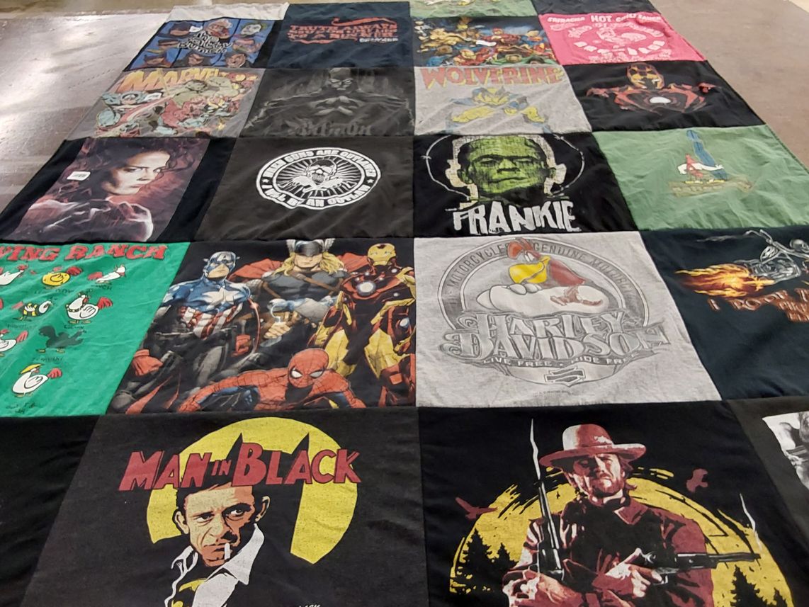 T-shirt quilt with comics, movies themes by Cindy from GA