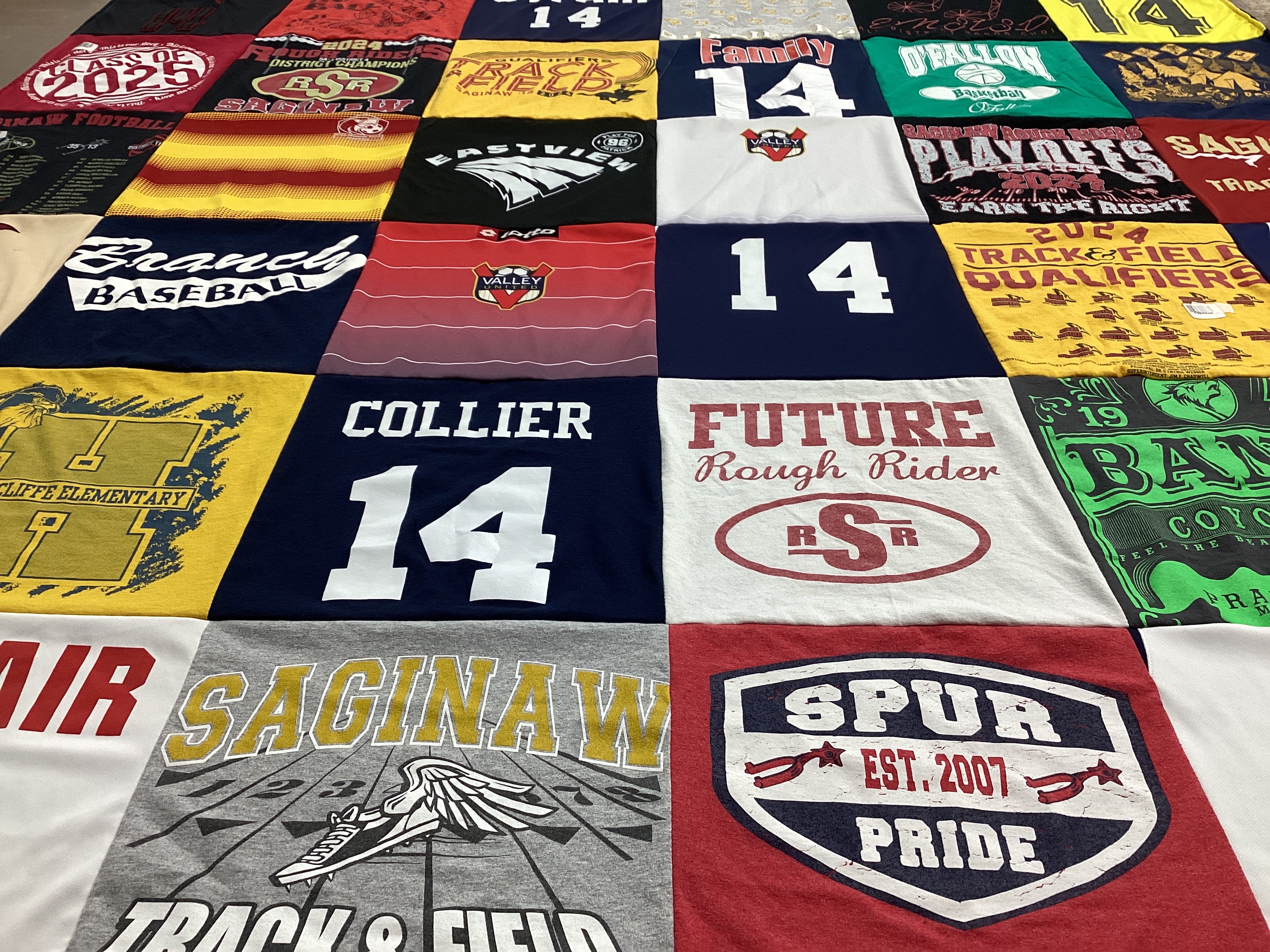 T-shirt quilt featuring saginaw track and field, collier team by Christa from TX