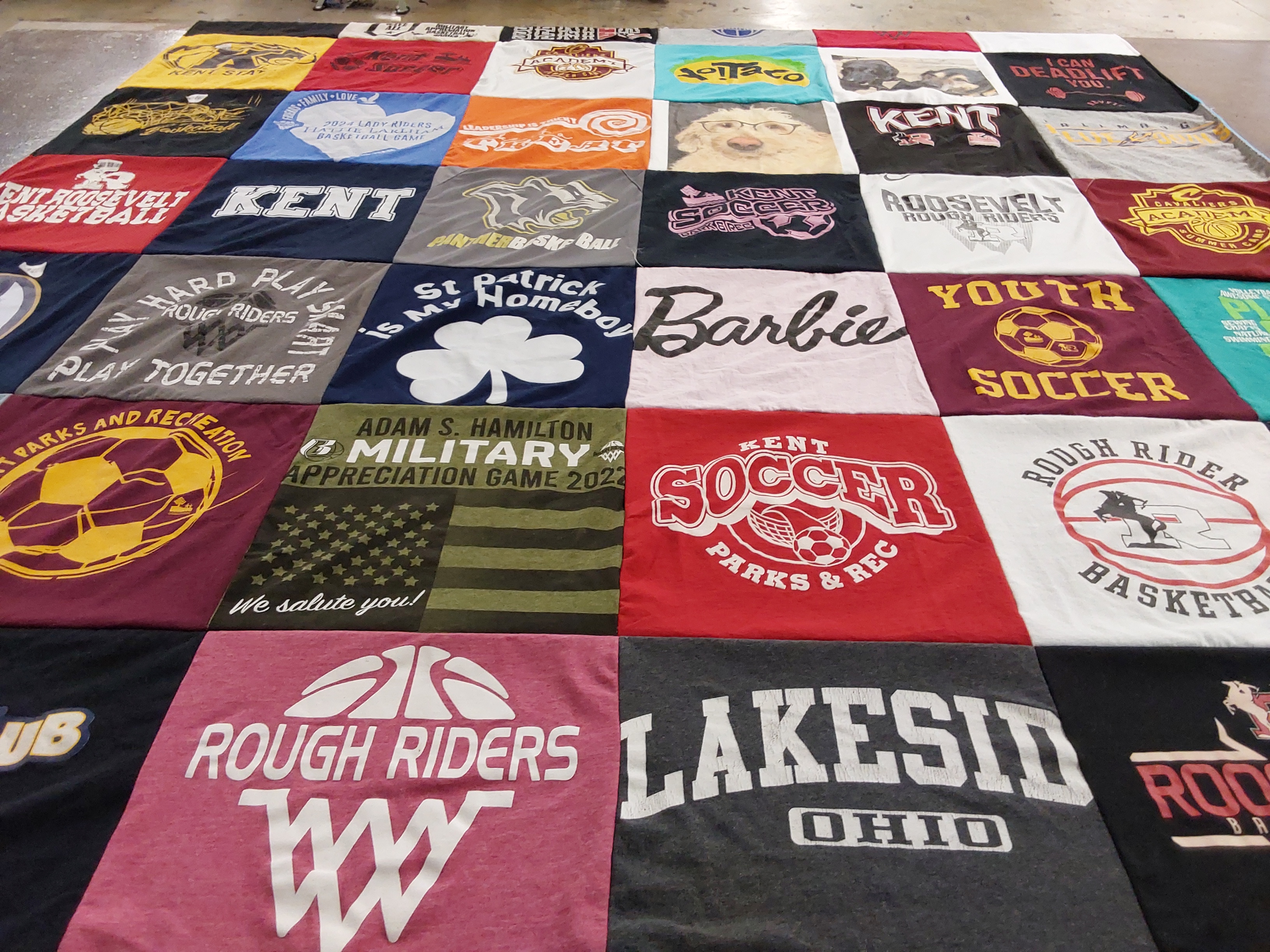 T-shirt quilt featuring soccer team, rough riders basketball team by Cathy from OH