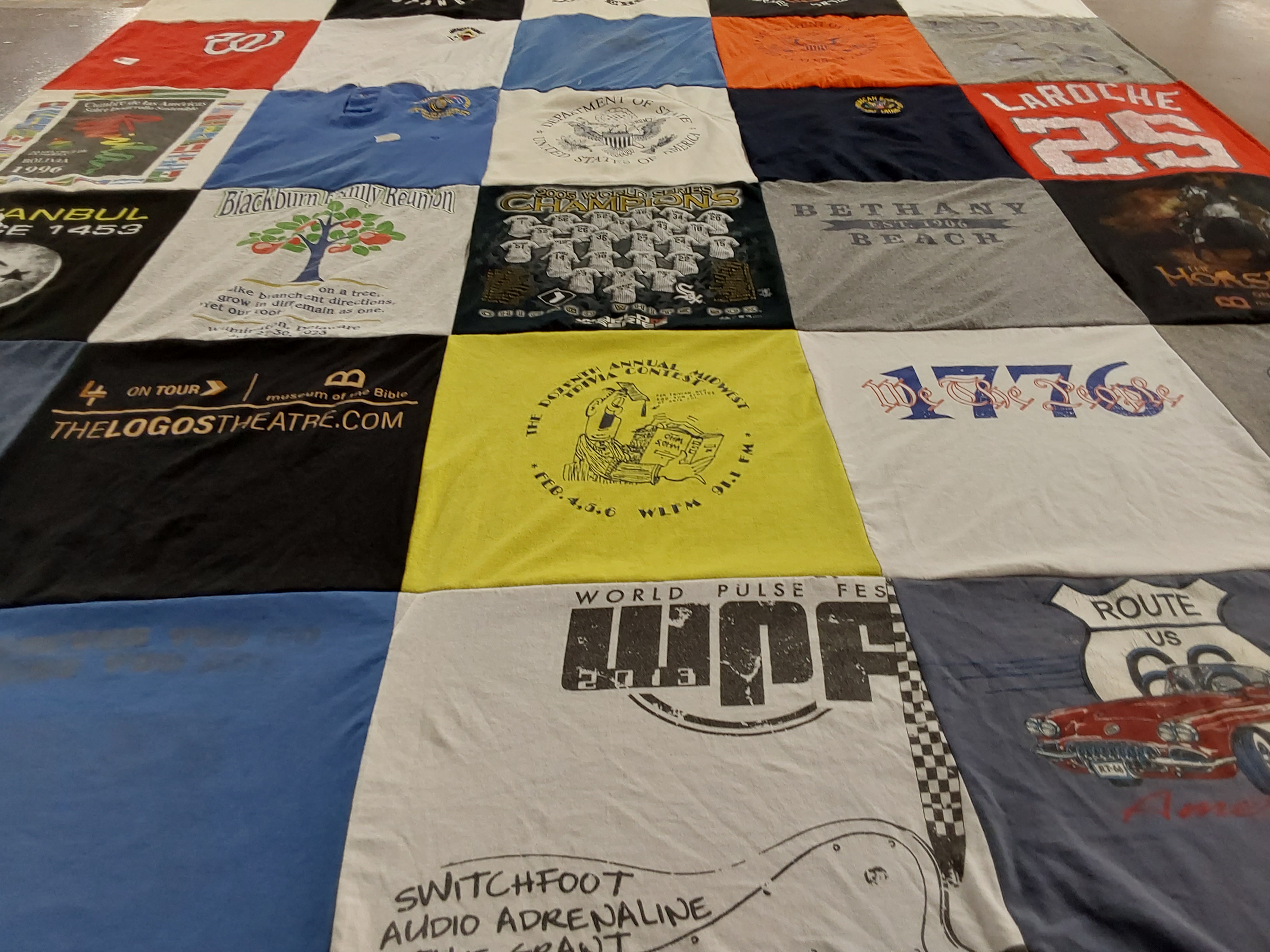 T-shirt quilt with music, theater themes by Ann from VA