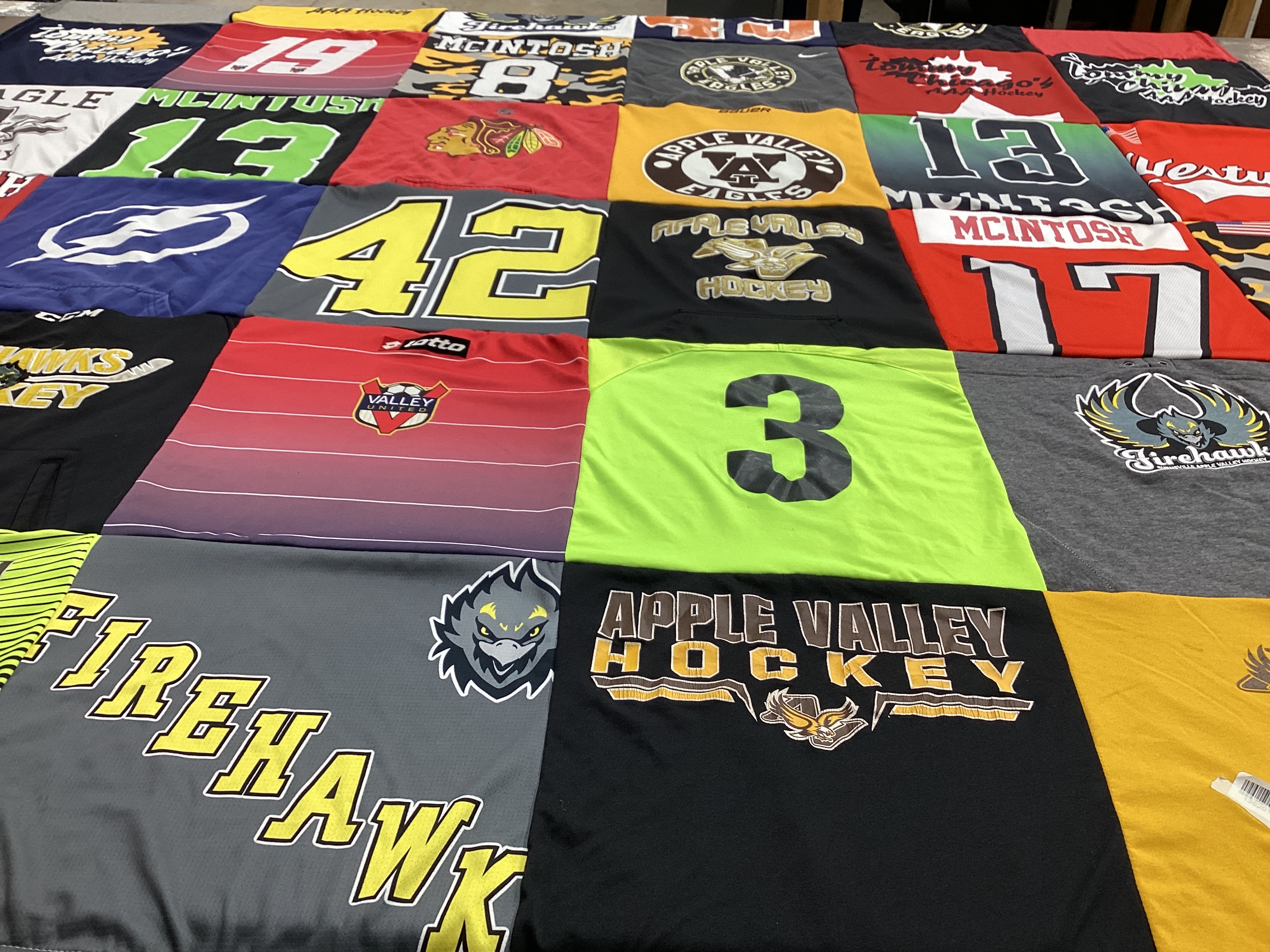 T-shirt quilt featuring apple valley hockey by Catherine Jamie from MN