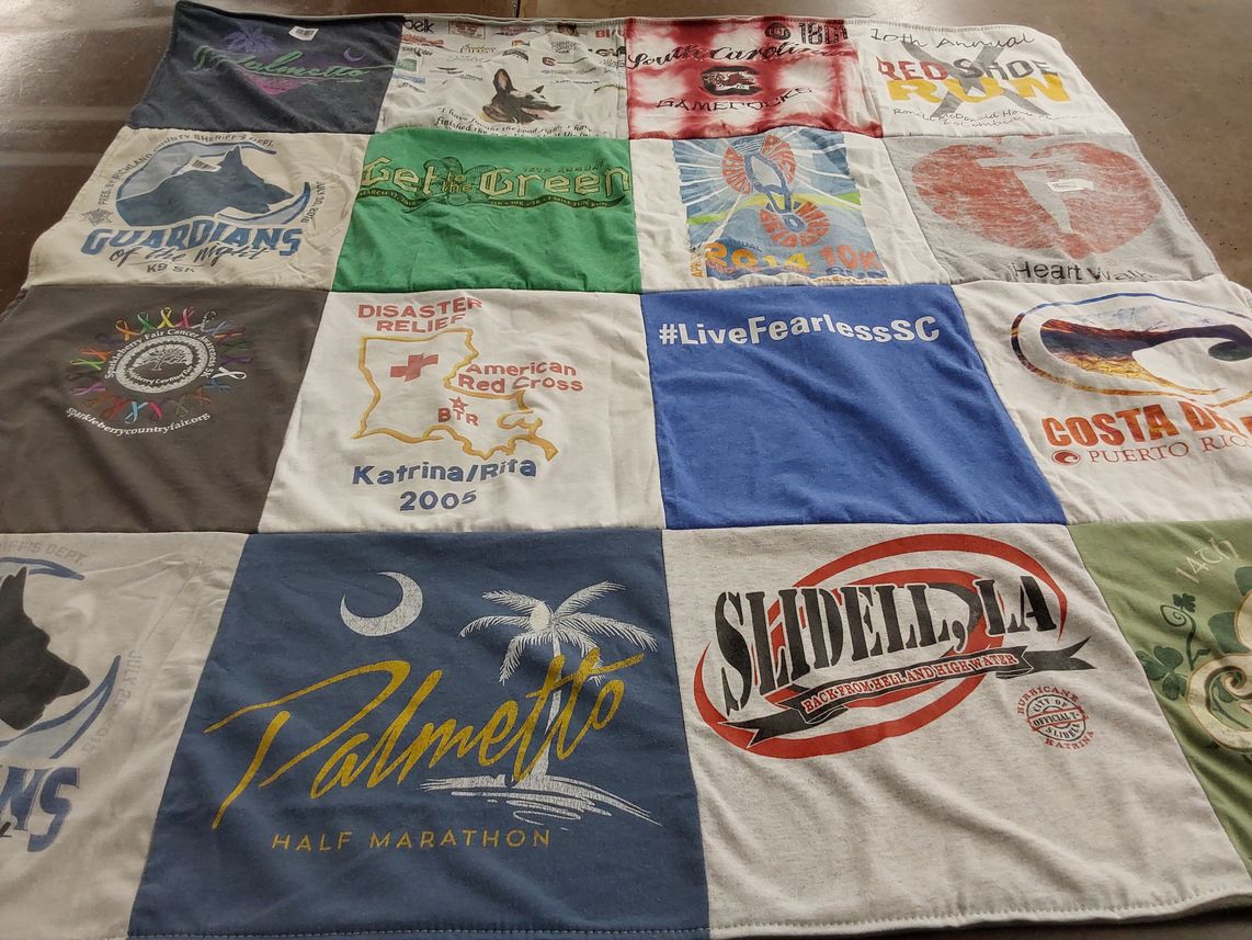 T-shirt quilt with disaster relief, marathons themes by Olga from SC