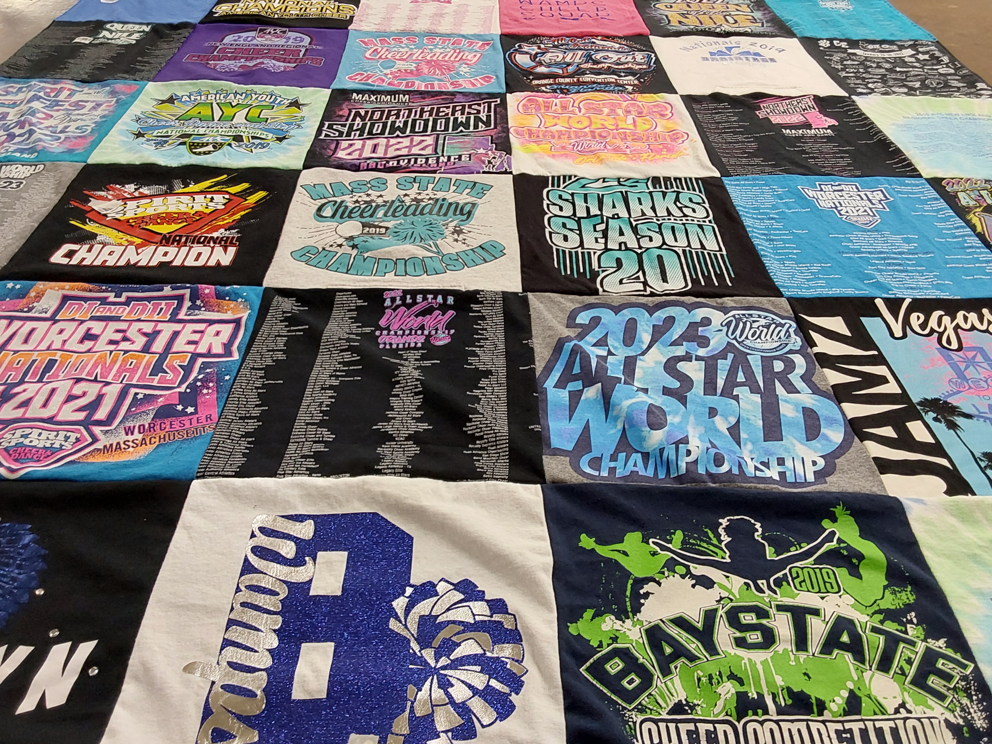 T-shirt quilt with cheerleading, competitions themes by rita from MA