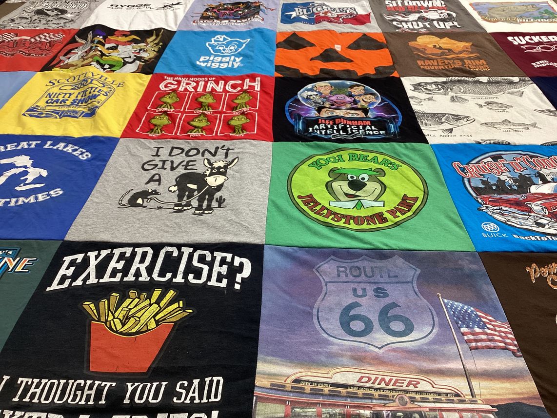 T-shirt quilt with outdoor, adventure themes by kathy from MI