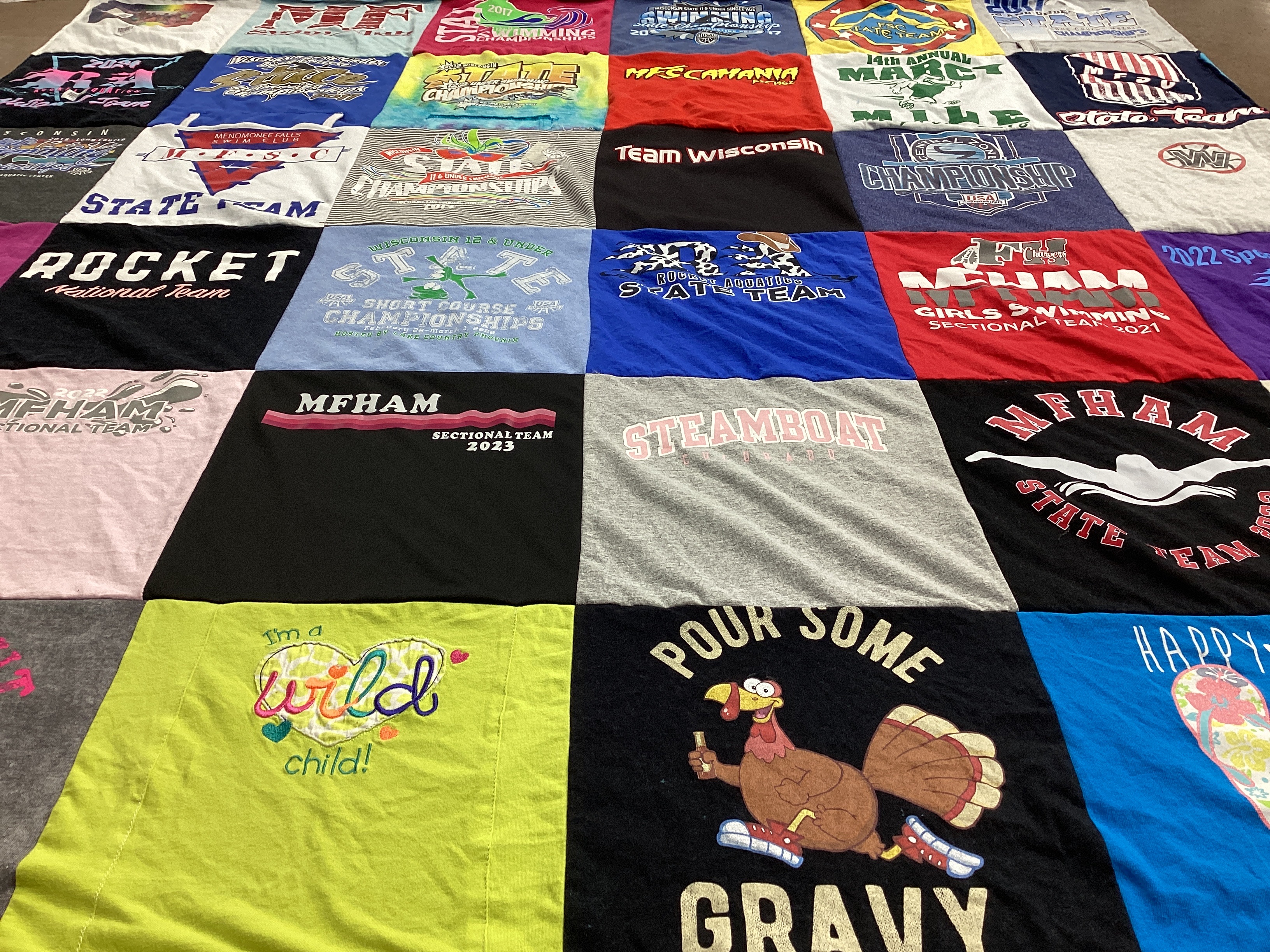 T-shirt quilt featuring mfham state team by Lesley from WI