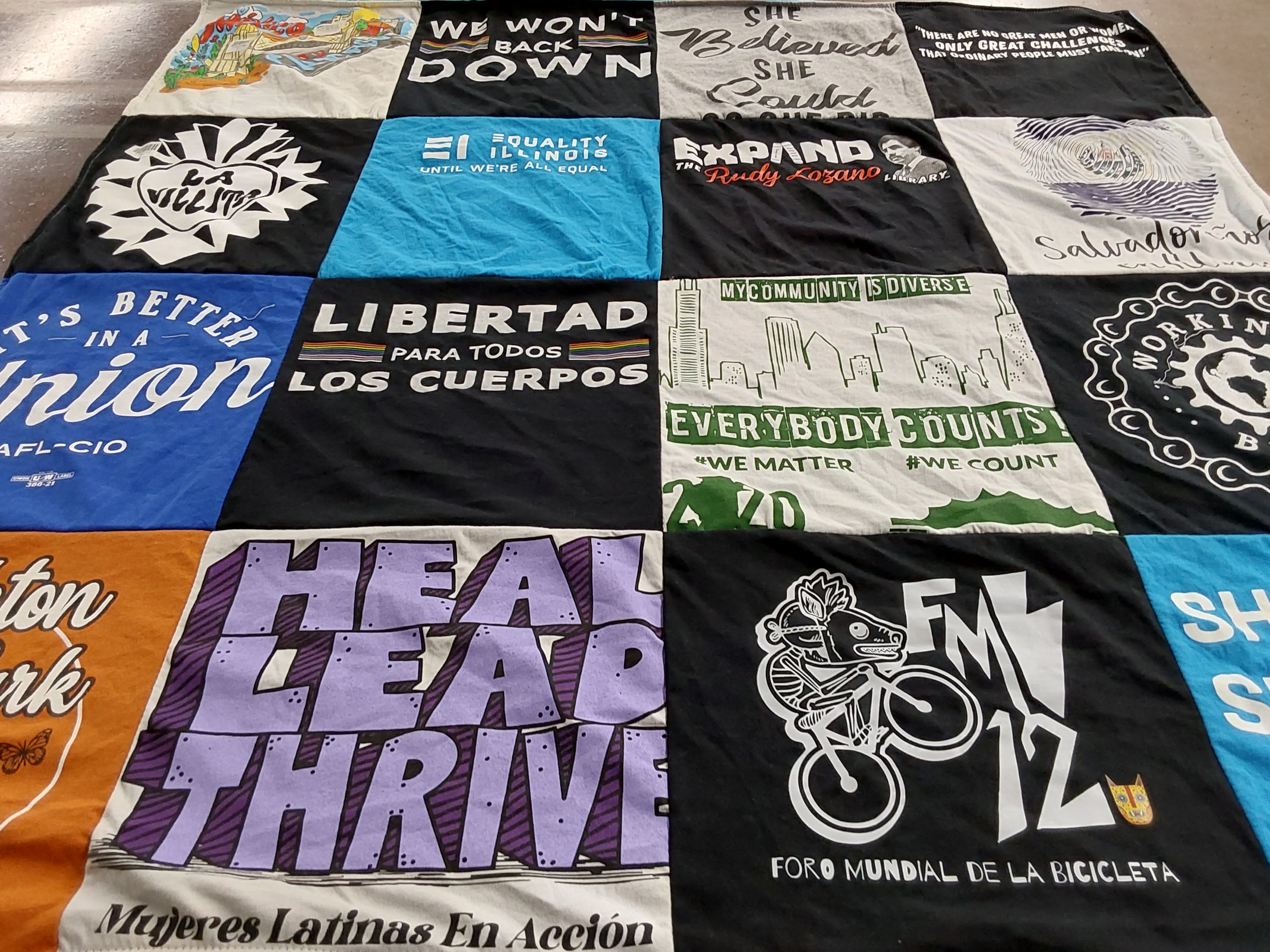 T-shirt quilt with community, activism themes by Celina from IL