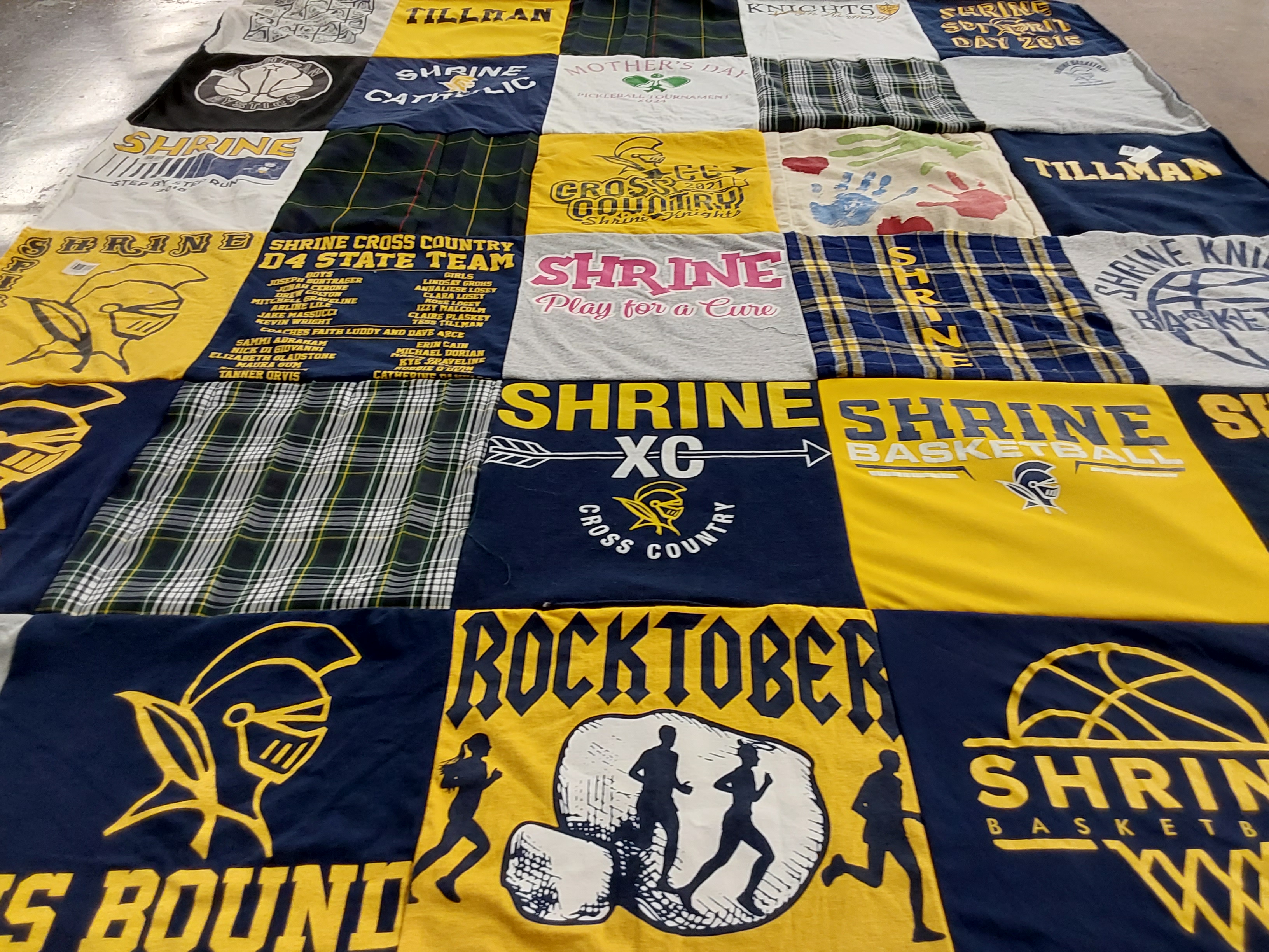 T-shirt quilt featuring shrine cross country, shrine basketball by Katie from MI