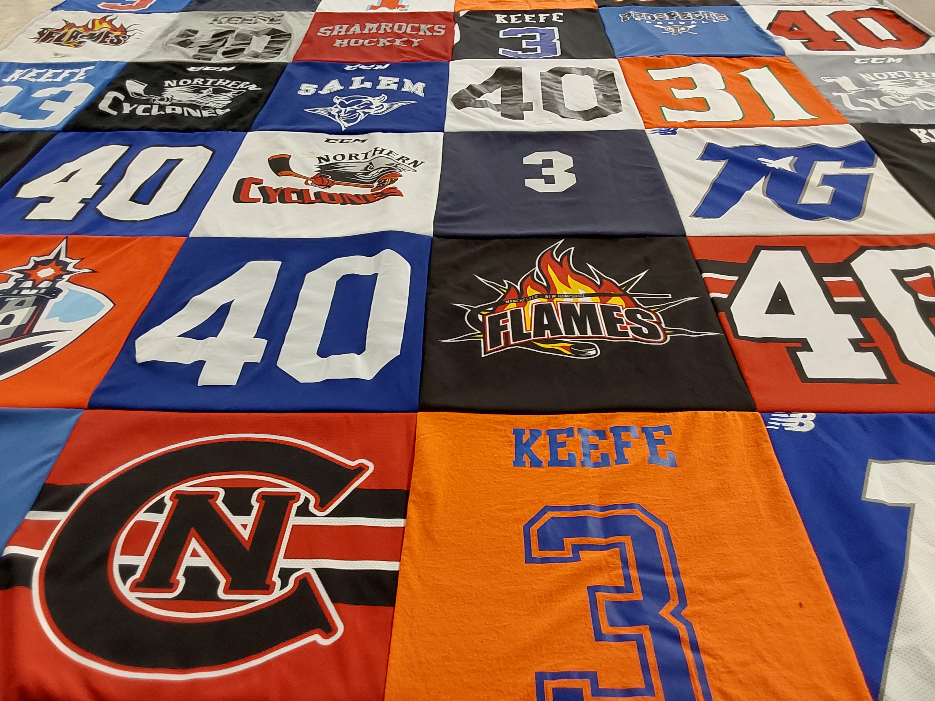 T-shirt quilt featuring northern cyclones, flames by Michelle from NH