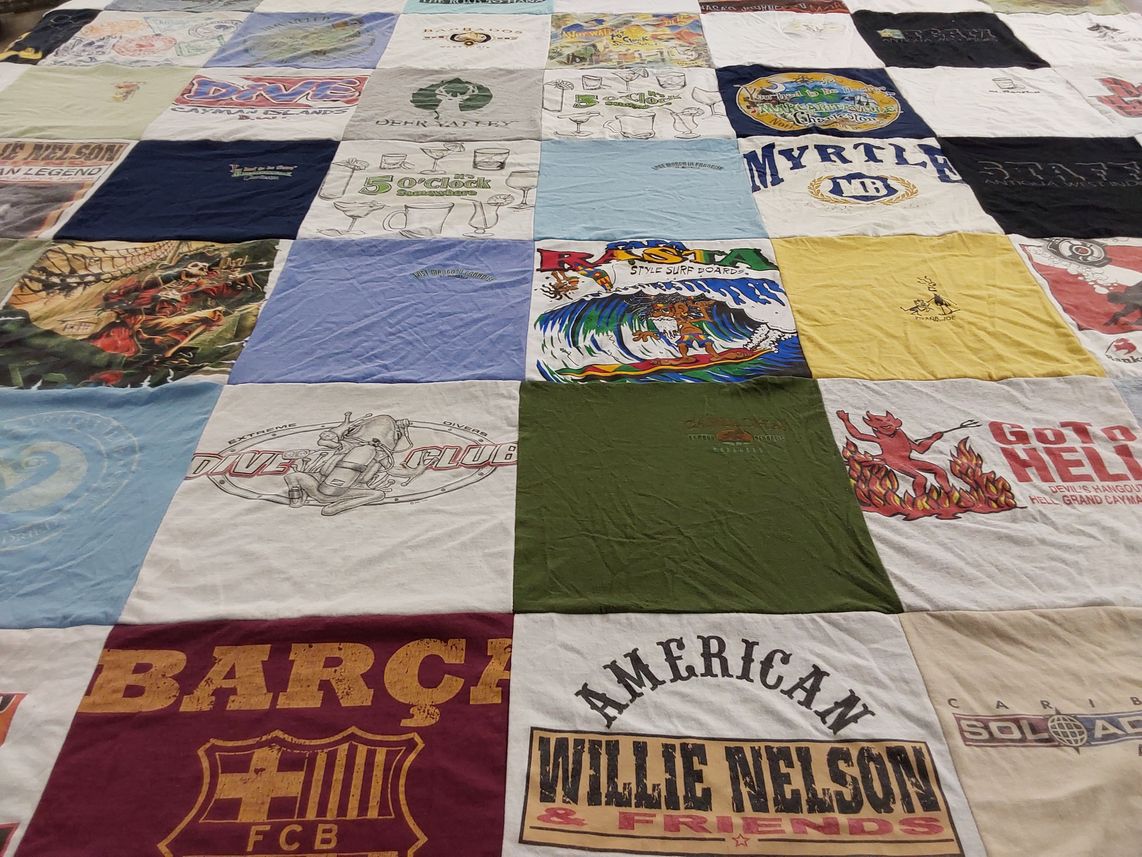 T-shirt quilt with diving, surfing themes by Brinda from TN