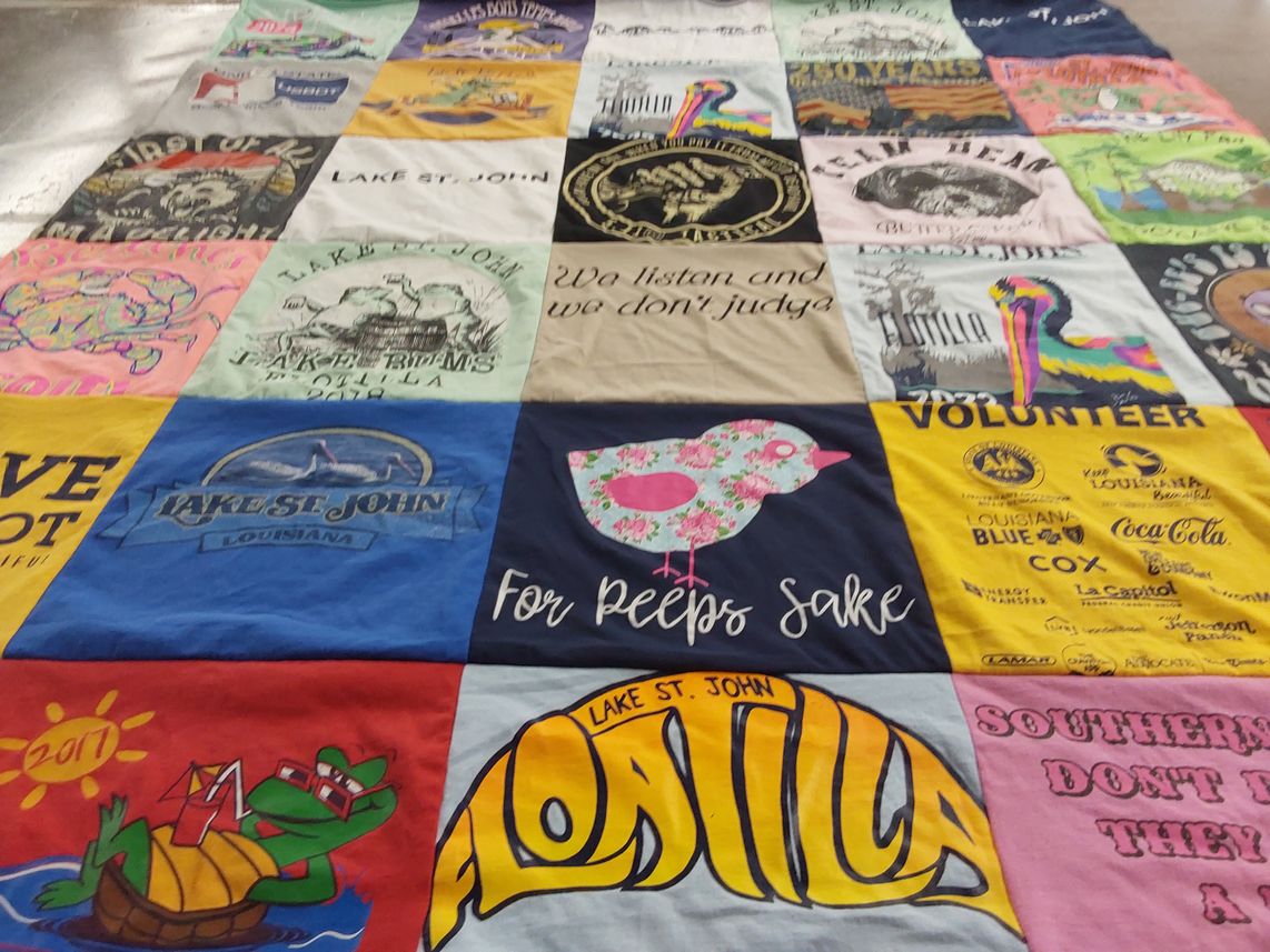 T-shirt quilt with community, volunteering themes by Darlene from LA