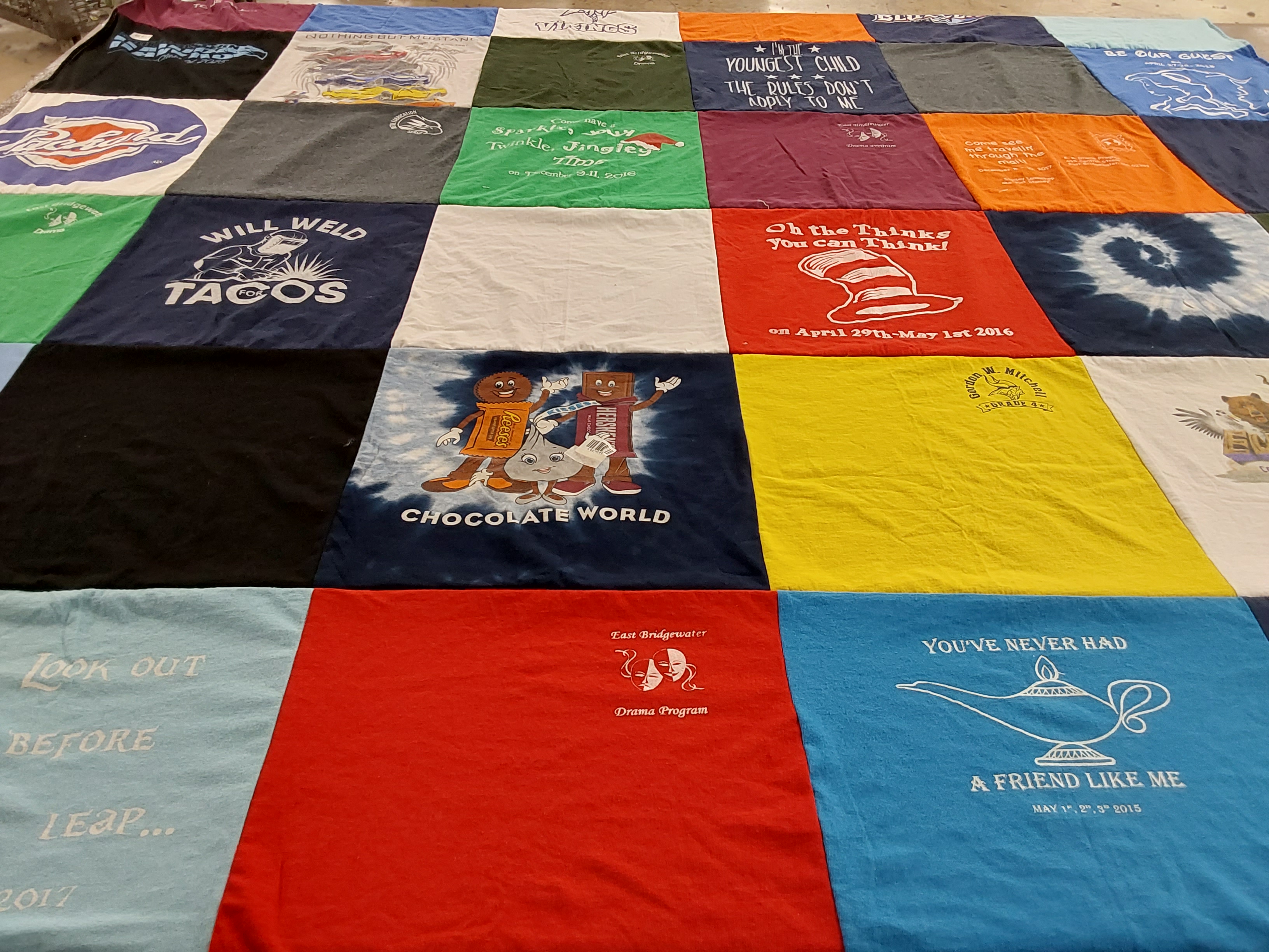 T-shirt quilt with cooking, drama themes by Kimberley from MA