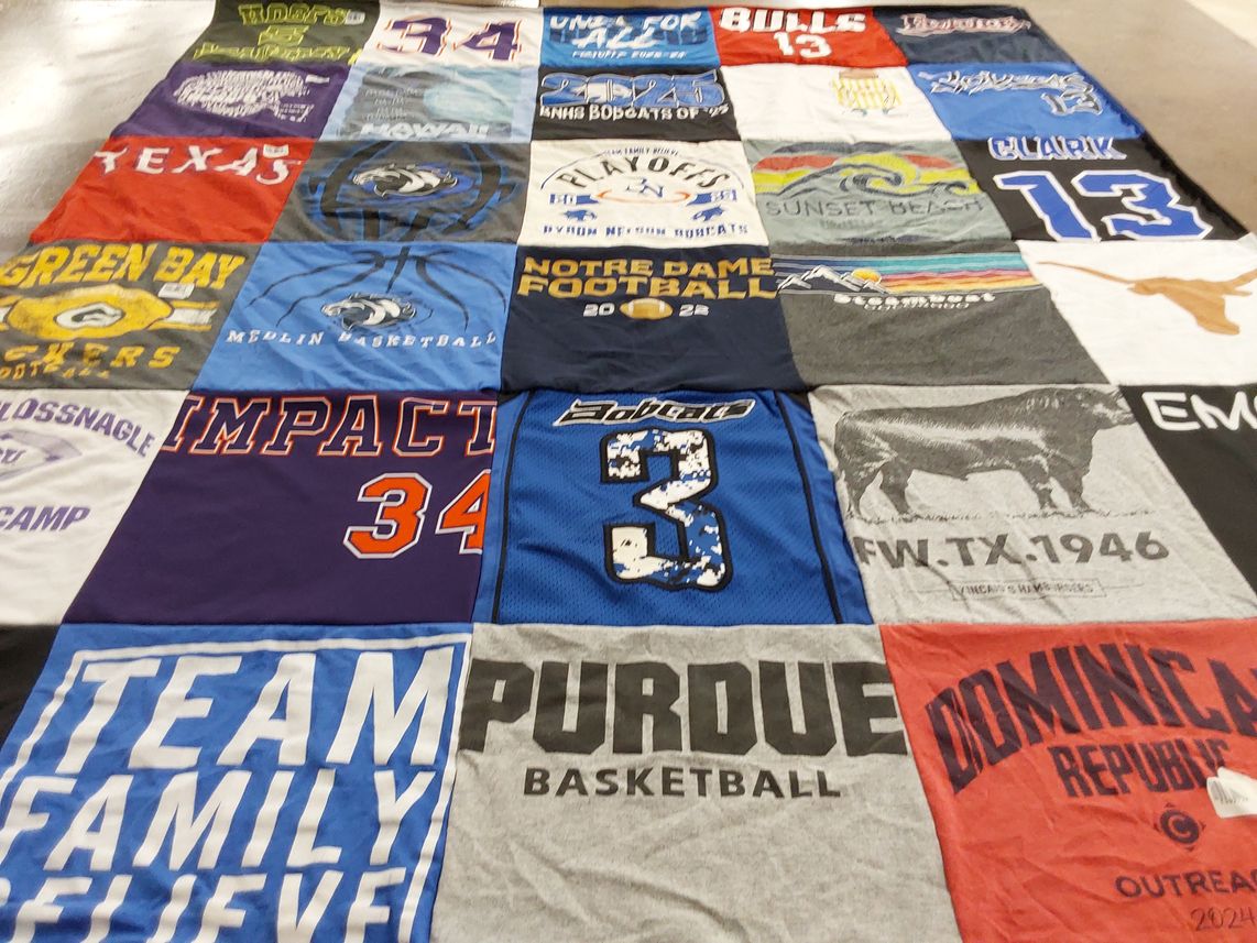 T-shirt quilt featuring green bay packers, notre dame fighting irish by Jennifer from TX