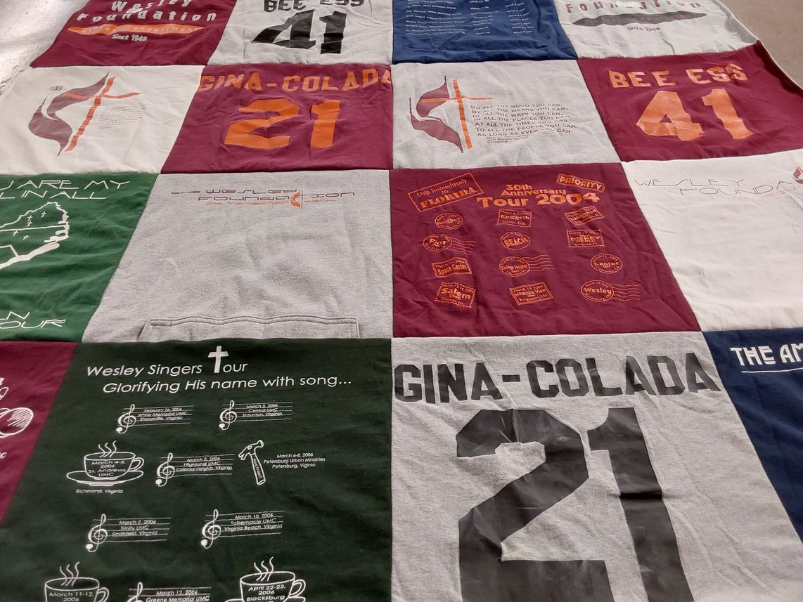 T-shirt quilt with music, community service themes by Gina from VA