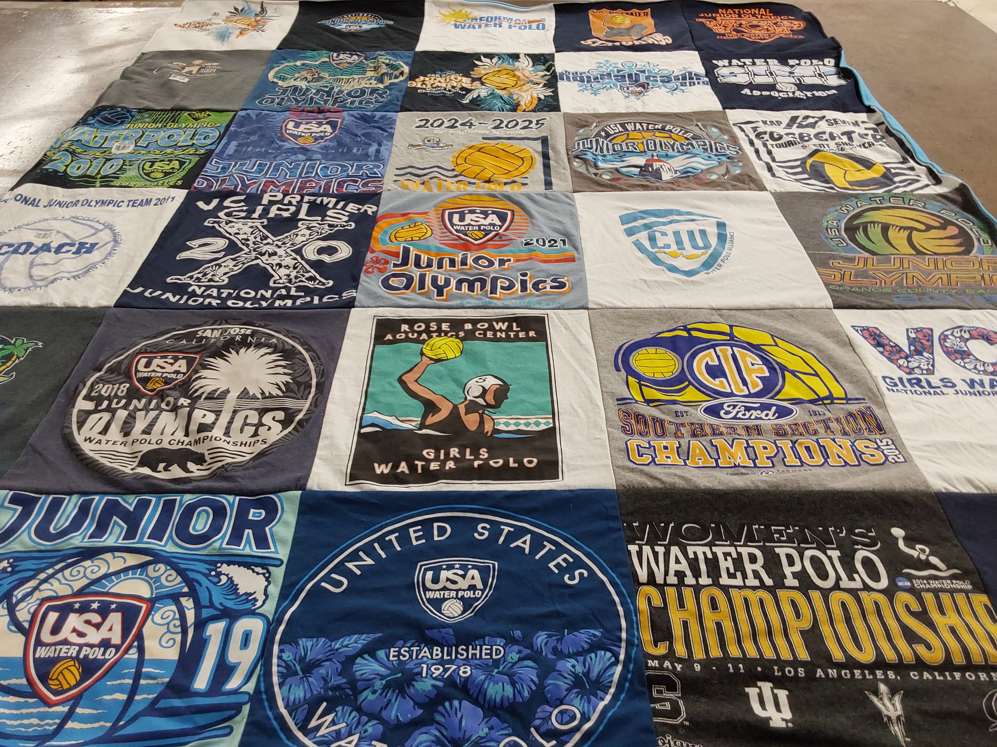 T-shirt quilt with water polo, sports themes by Joyce from CA
