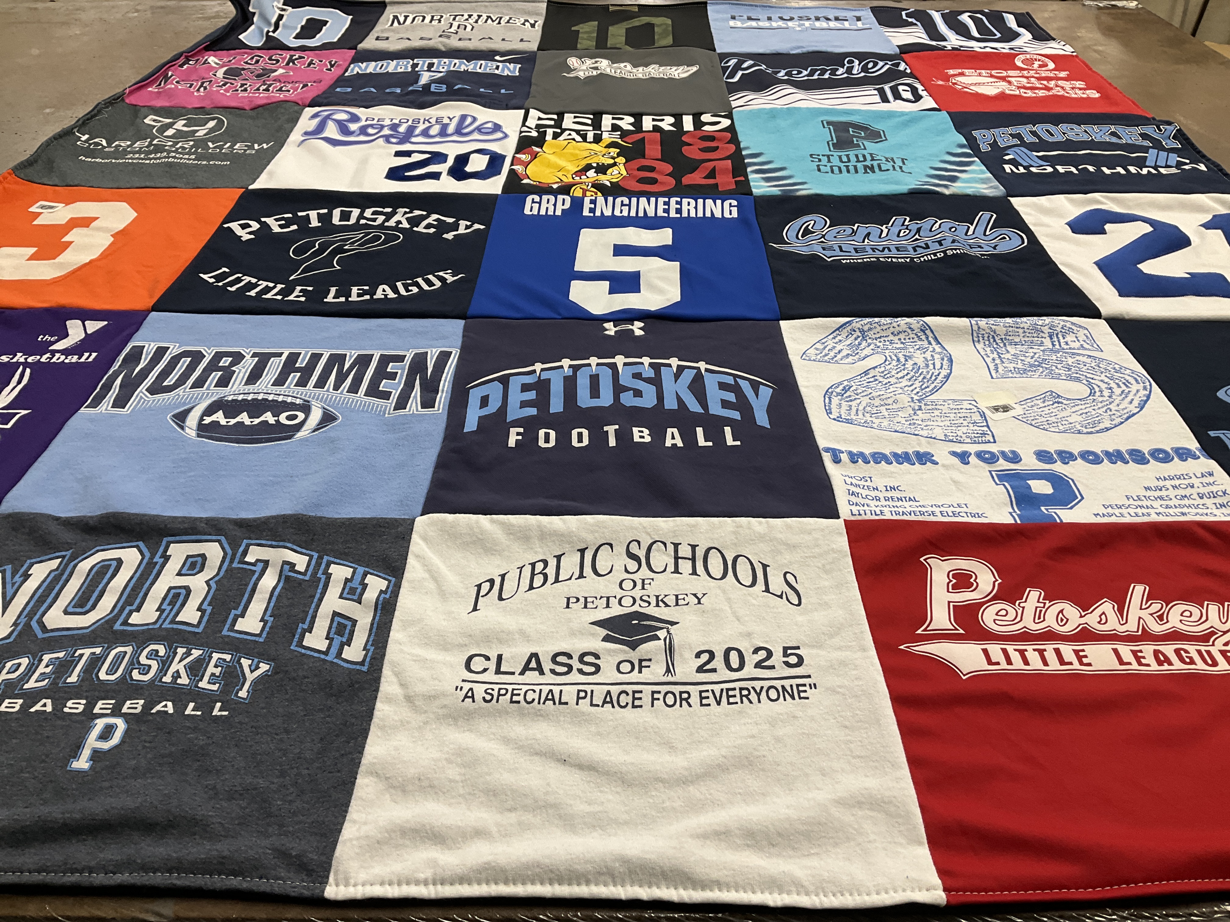 T-shirt quilt featuring petoskey football, petoskey little league by Molly from MI