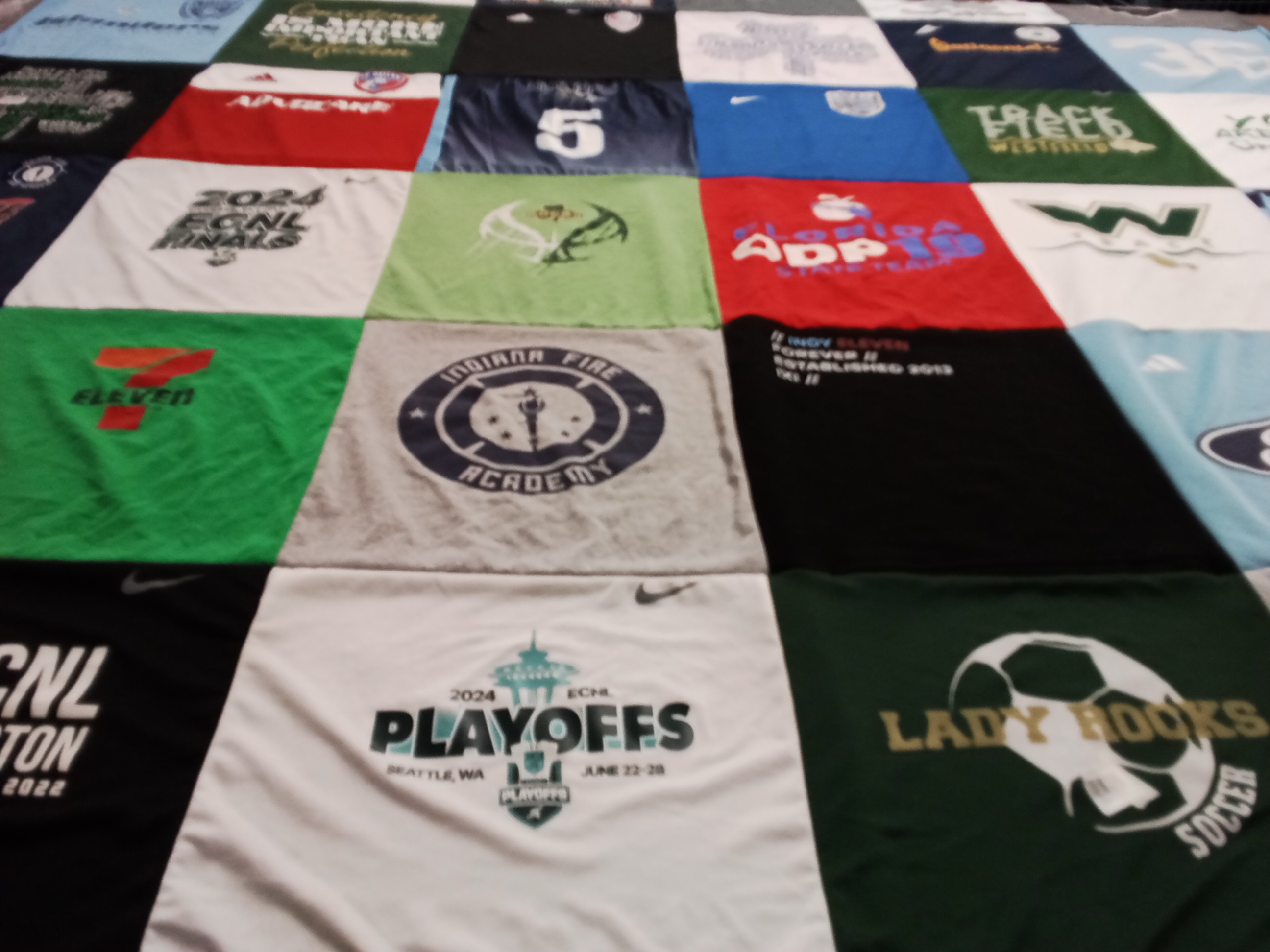 T-shirt quilt with soccer, sports themes by MaryEdith from IN