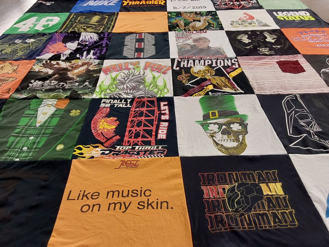 T-shirt quilt with music, sports themes by Tiffany from SC