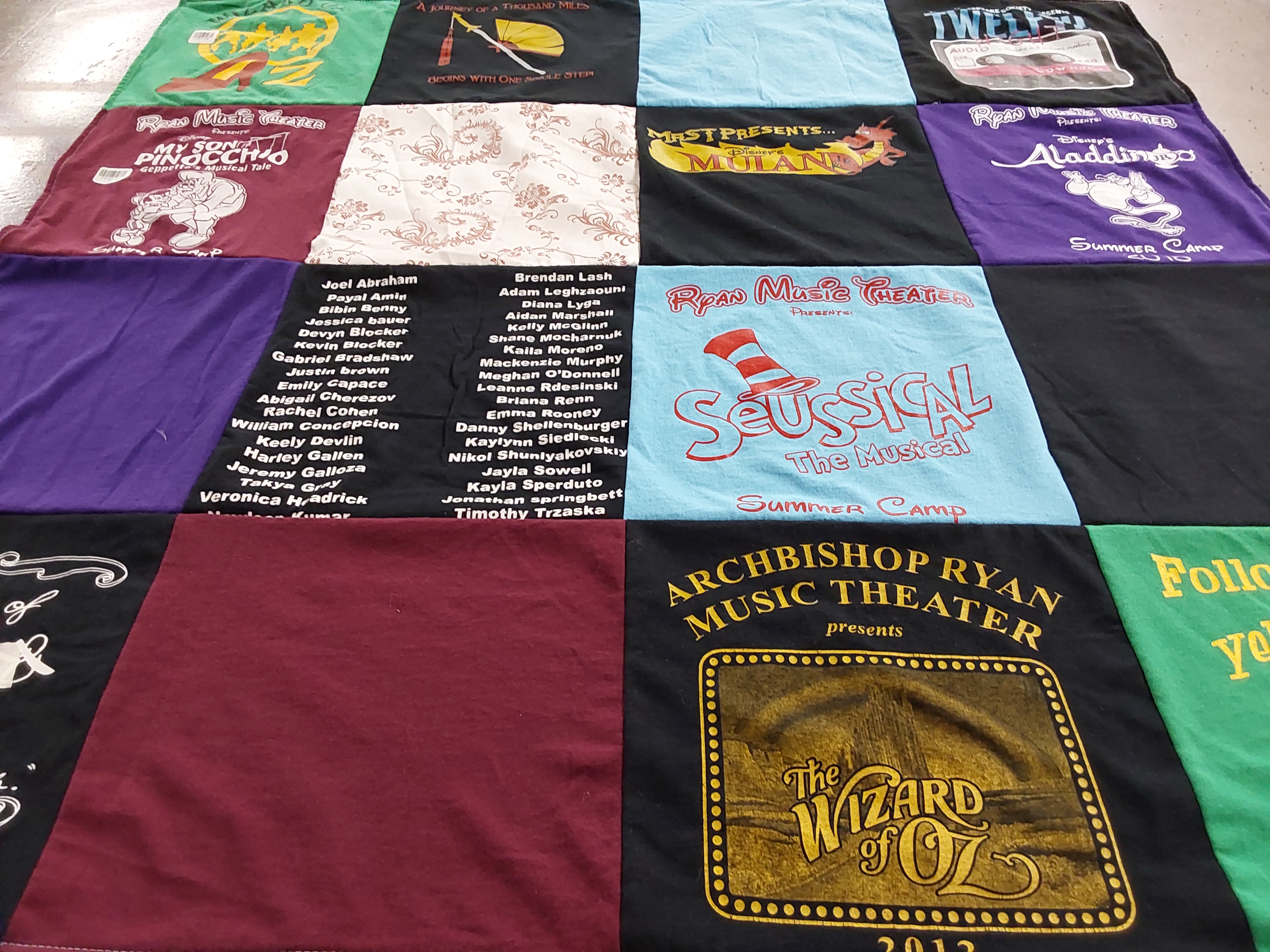 T-shirt quilt with theater, music themes by Eleanor from PA