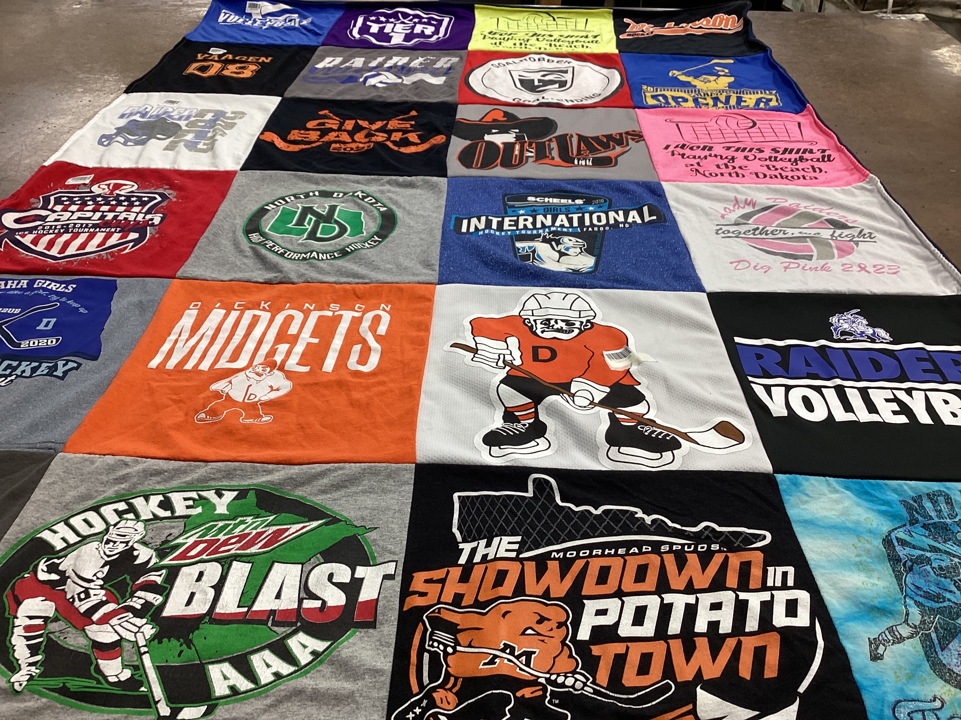 T-shirt quilt featuring dickinson midgets, moorhead spuds by Deb from ND