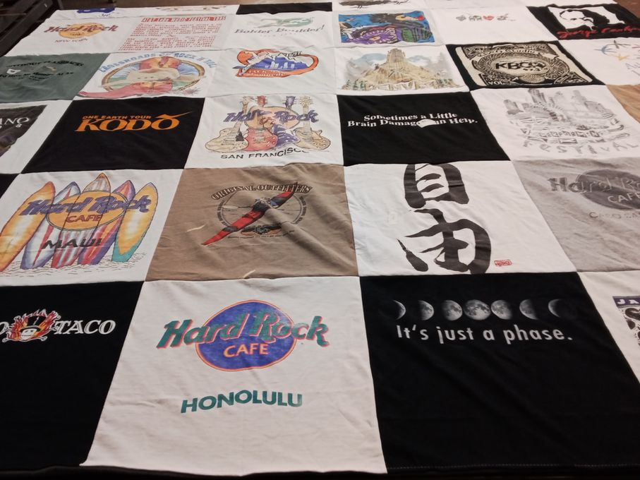 T-shirt quilt with music, travel themes by Pamela from CO