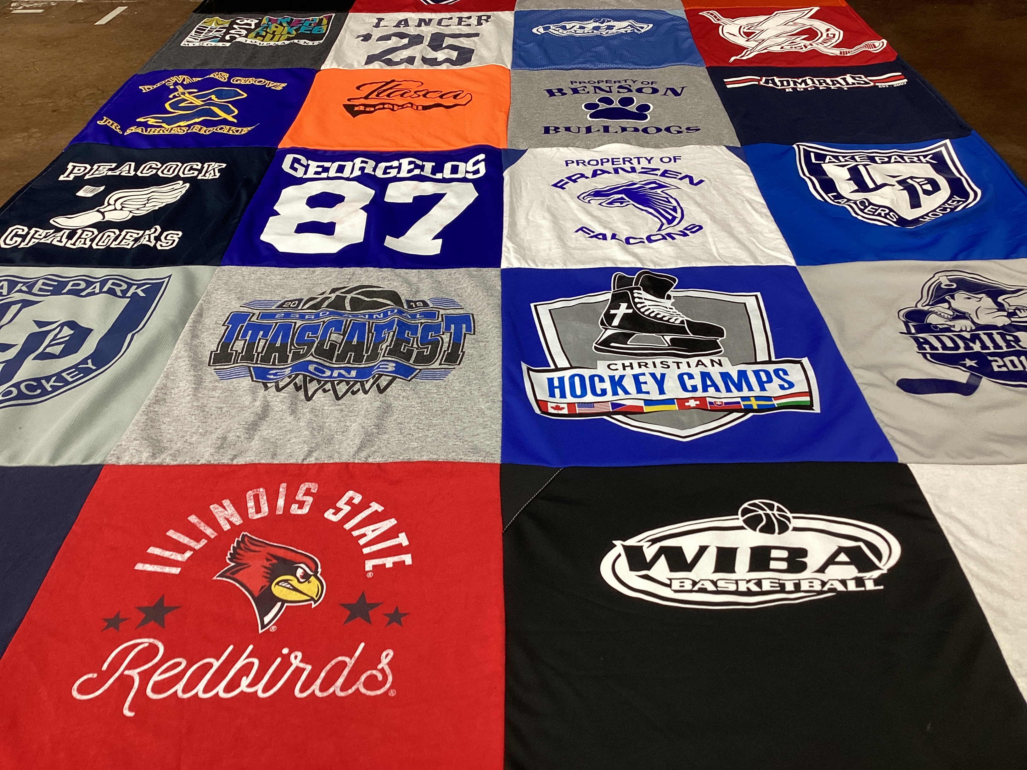 T-shirt quilt featuring lake park chargers hockey, benson bulldogs by Darcy from IL